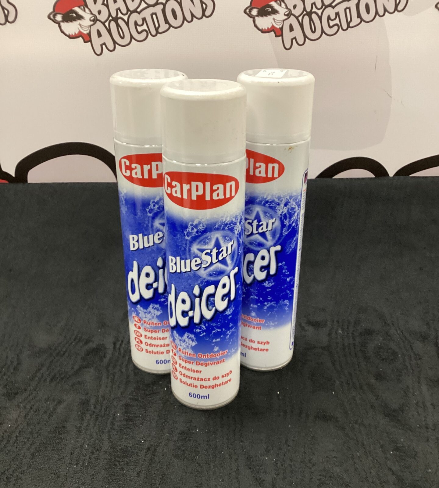 Three cans of carplan blue star de-icer