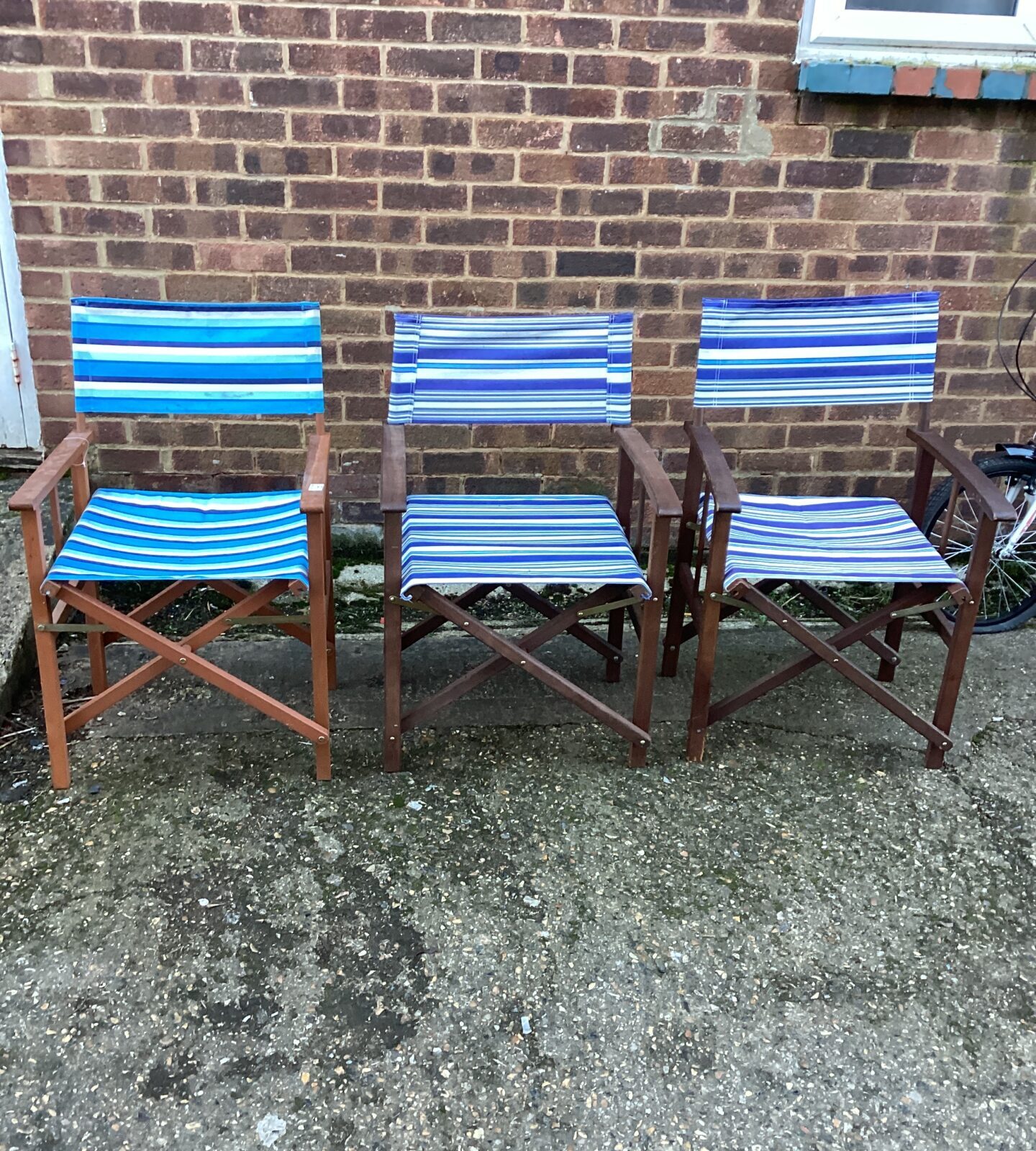 Three Folding Wooden and canvas chairs