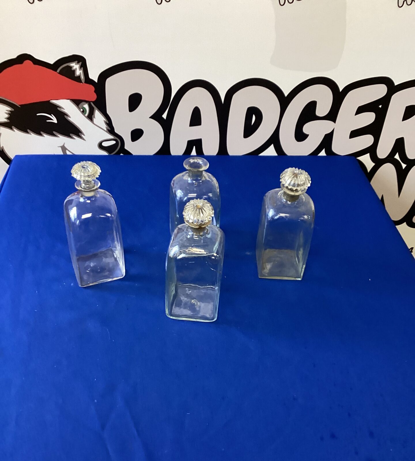 three georgian blown decanters & one other