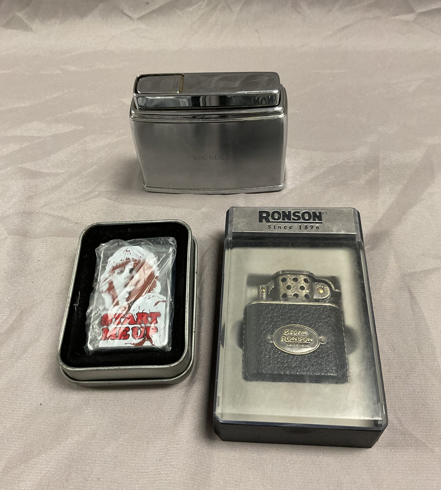 Three lighters Inc Ronson and Fisher butane table lighter