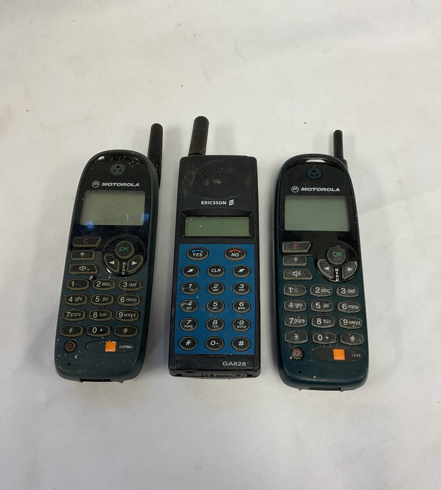 Three retro mobile phones inc motorola & ericsson