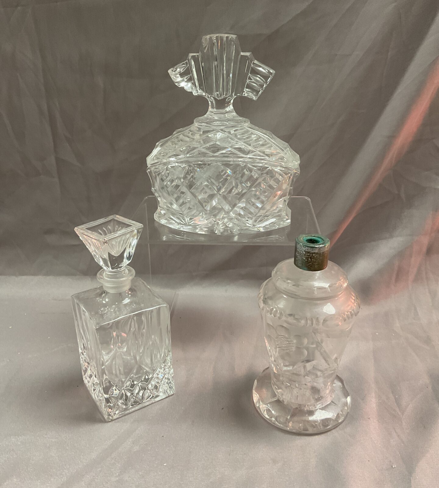 Three vintage perfume bottles