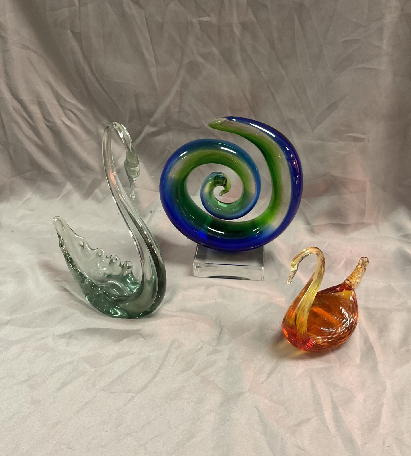 Two glass swans and Murano style glass sculpture