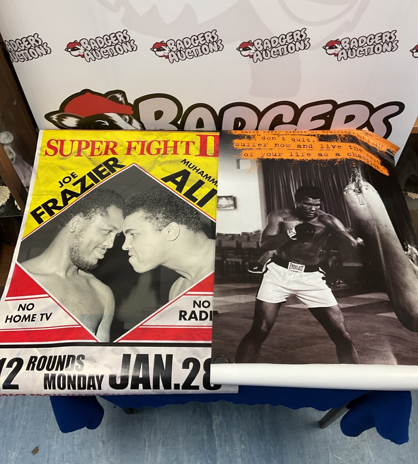 Two Mohammed ali boxing posters