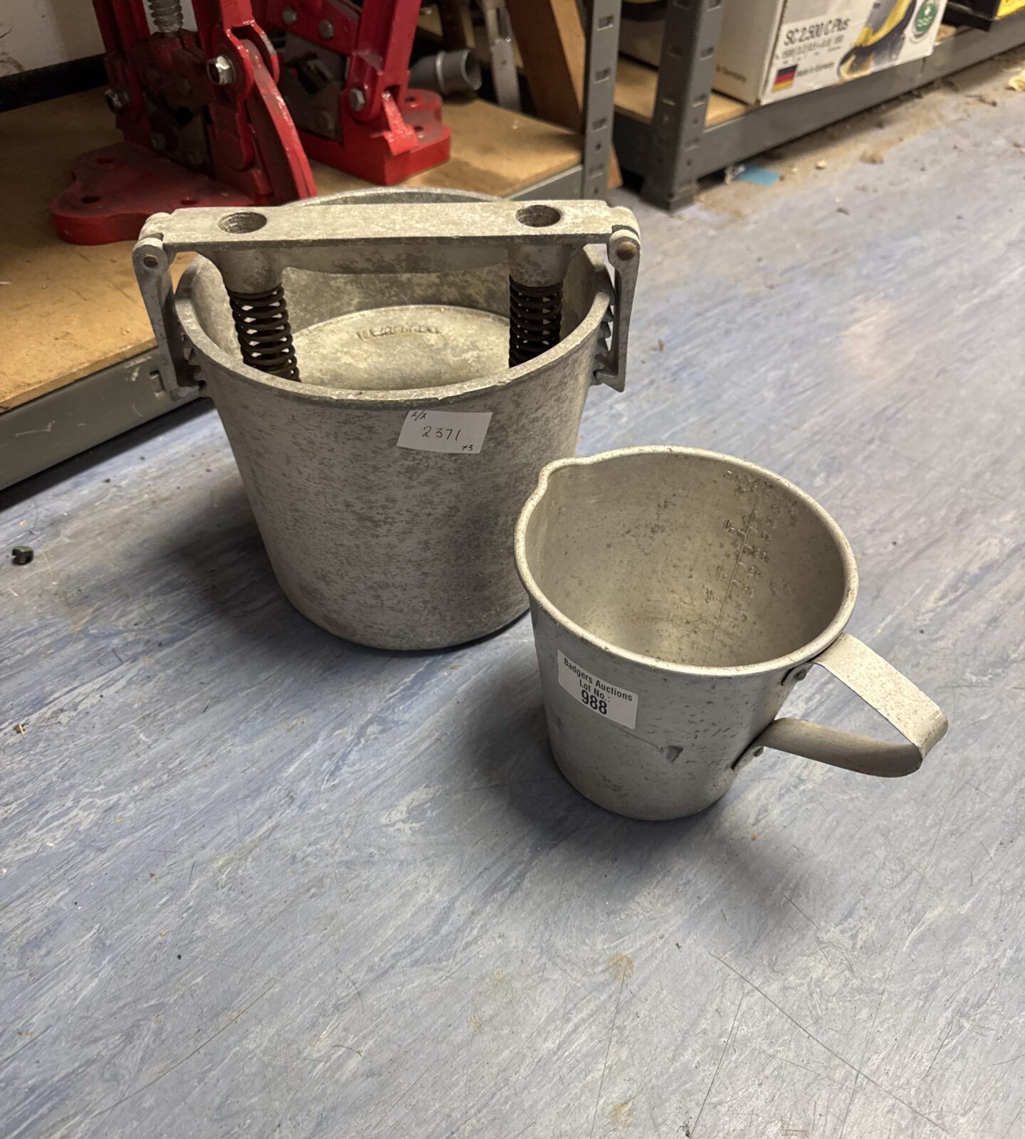 Vintage meat press with a jug