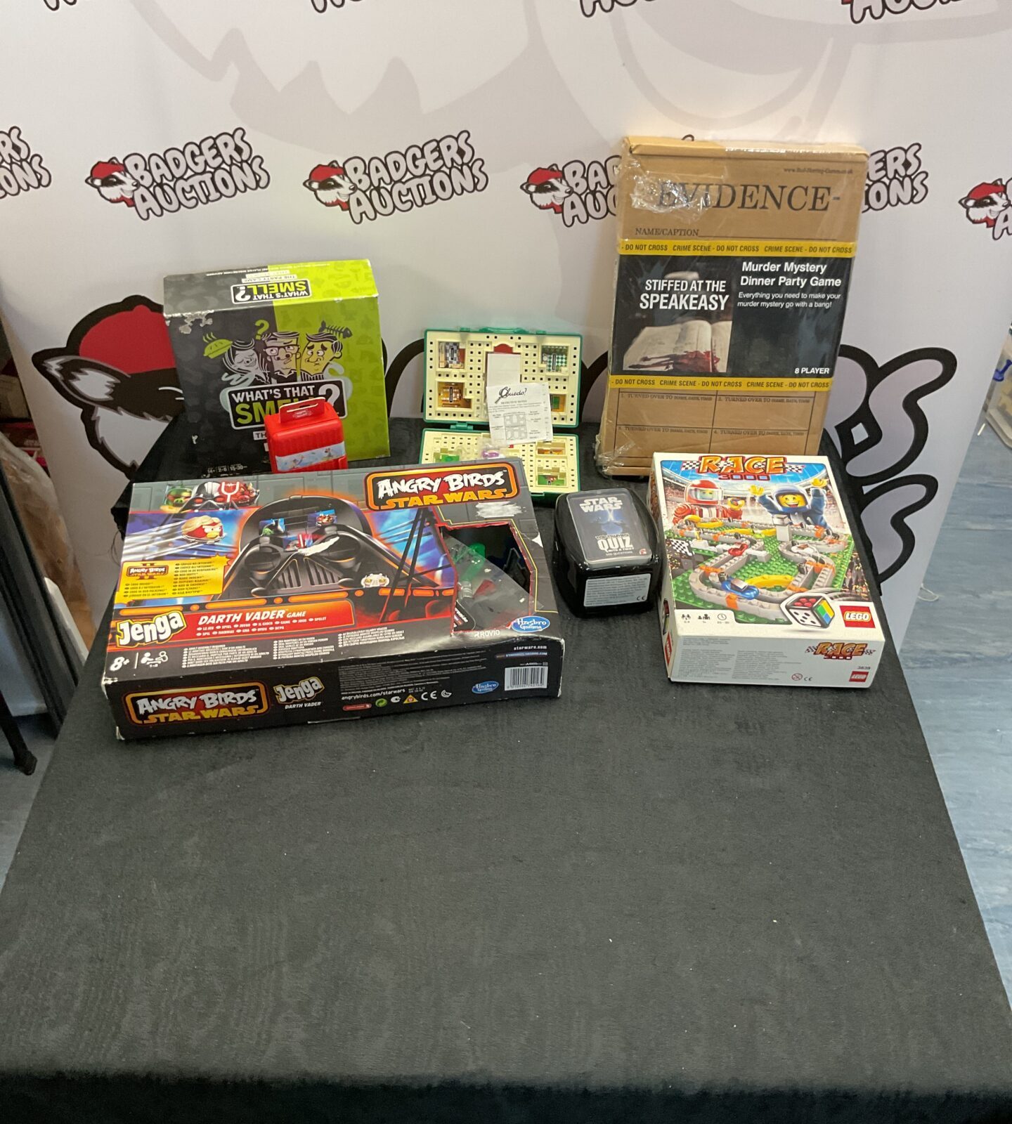 Box of mixed games and toys inc Lego racers, top trumps, cluedo and angry birds Star Wars