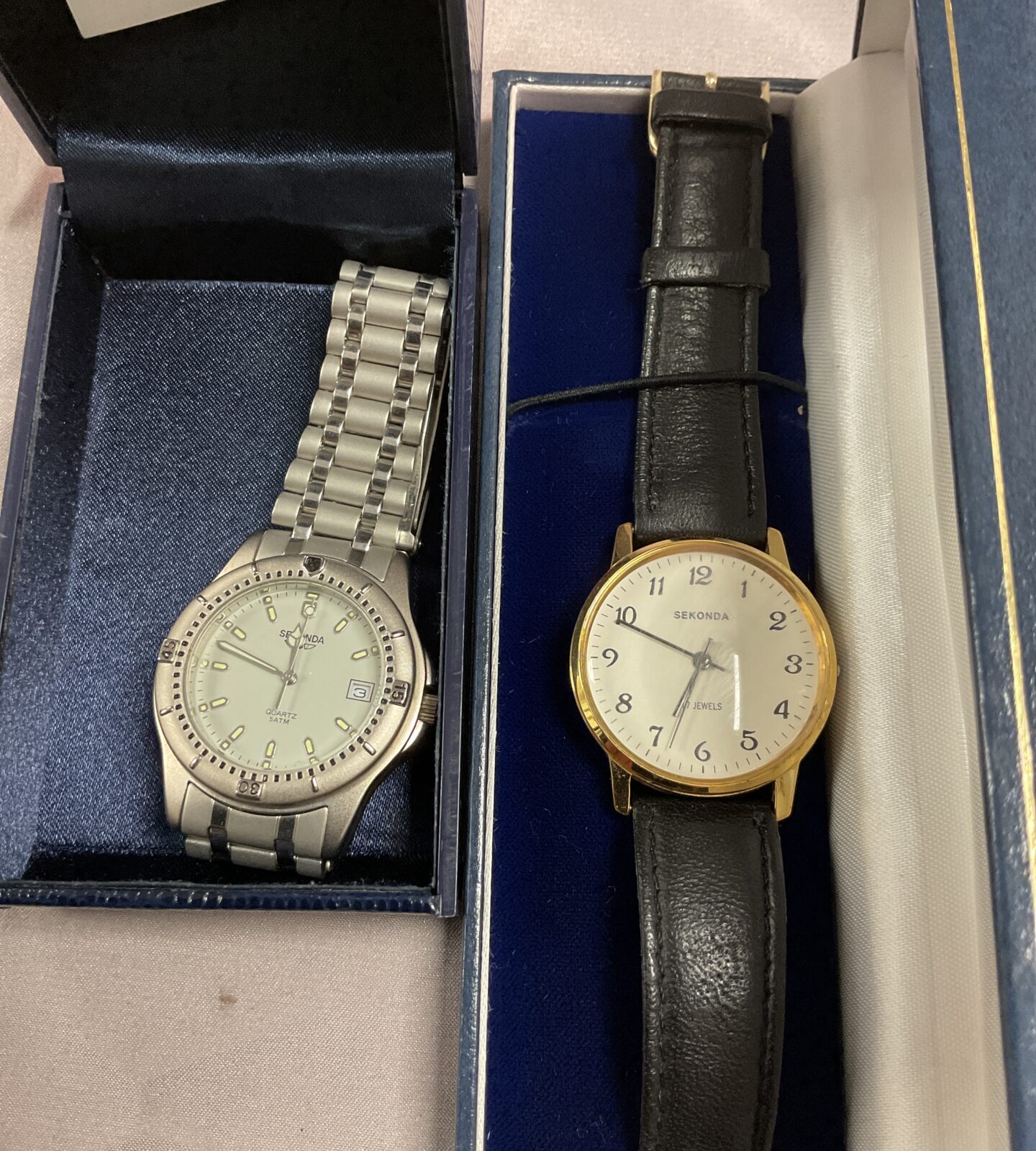 Two Sekonda watches