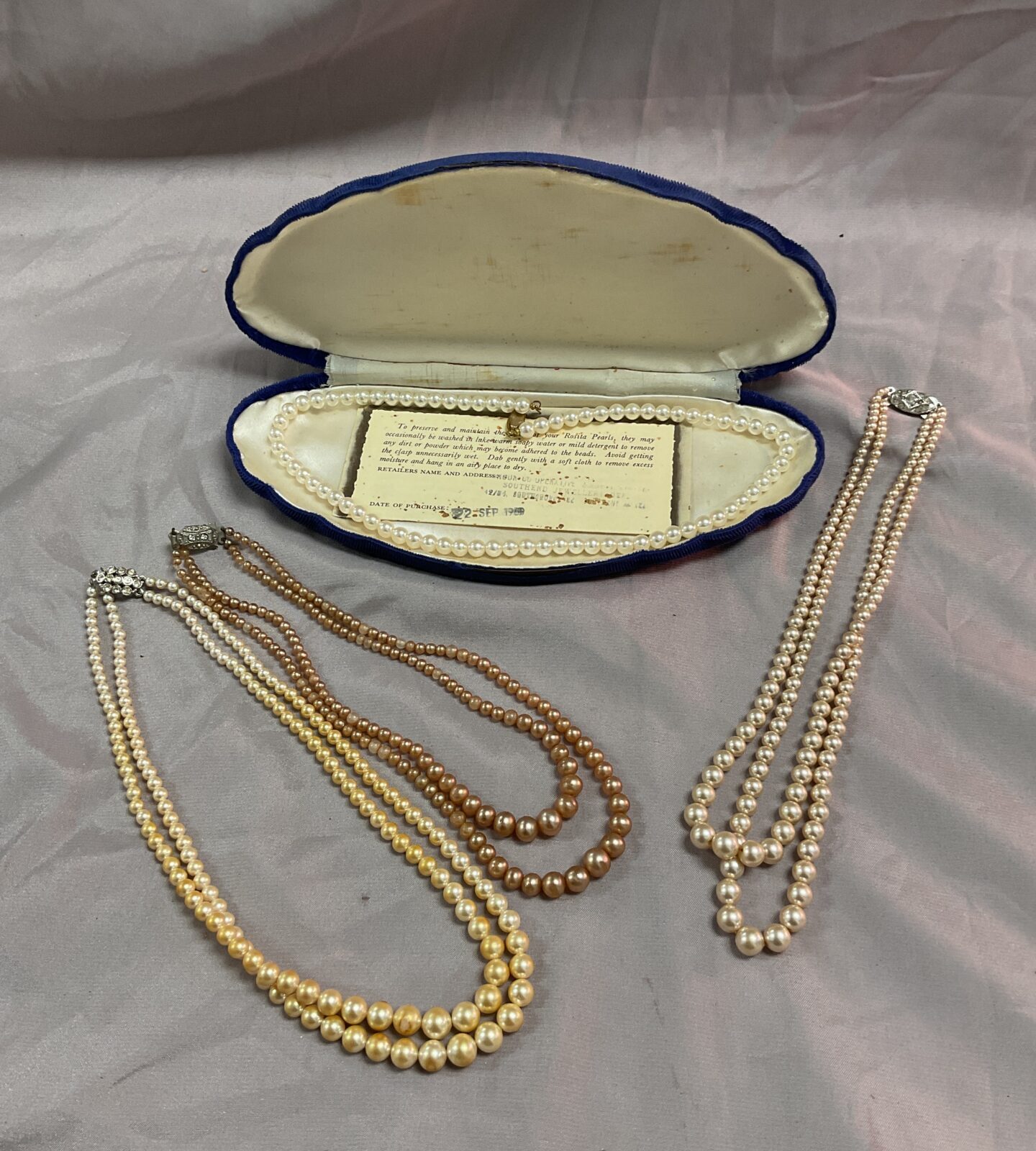 Four sets of faux pearl necklaces