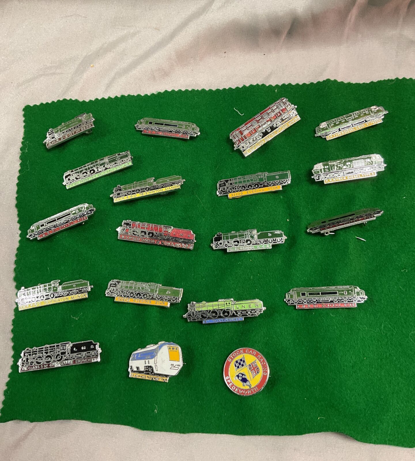 Collection of vintage train pin badges