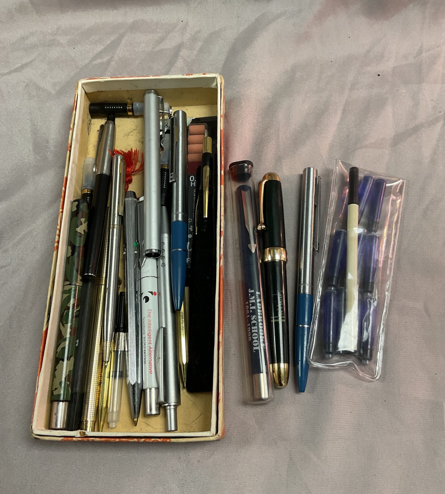 Box of assorted pens inc Parker and harrods