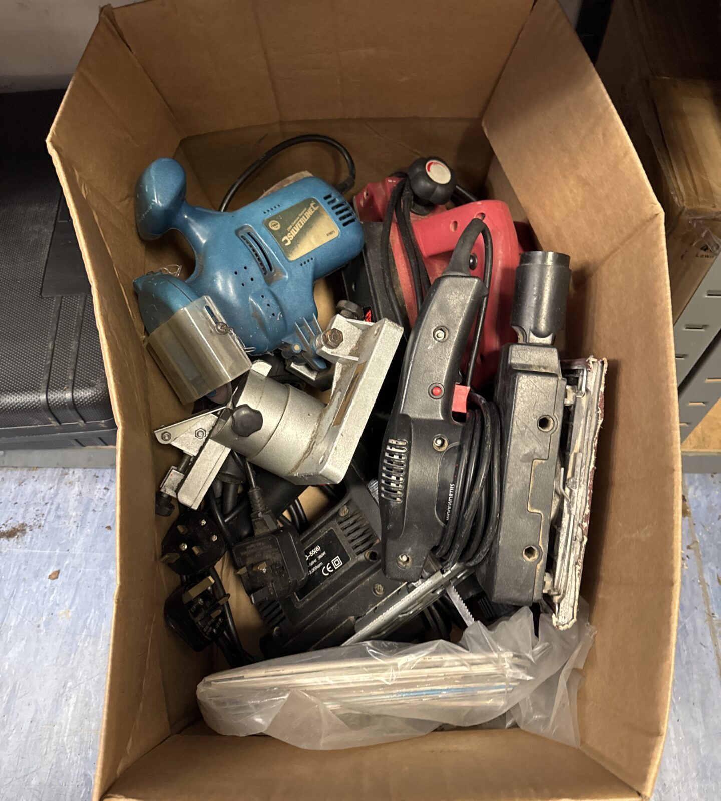 Box of untested power tools