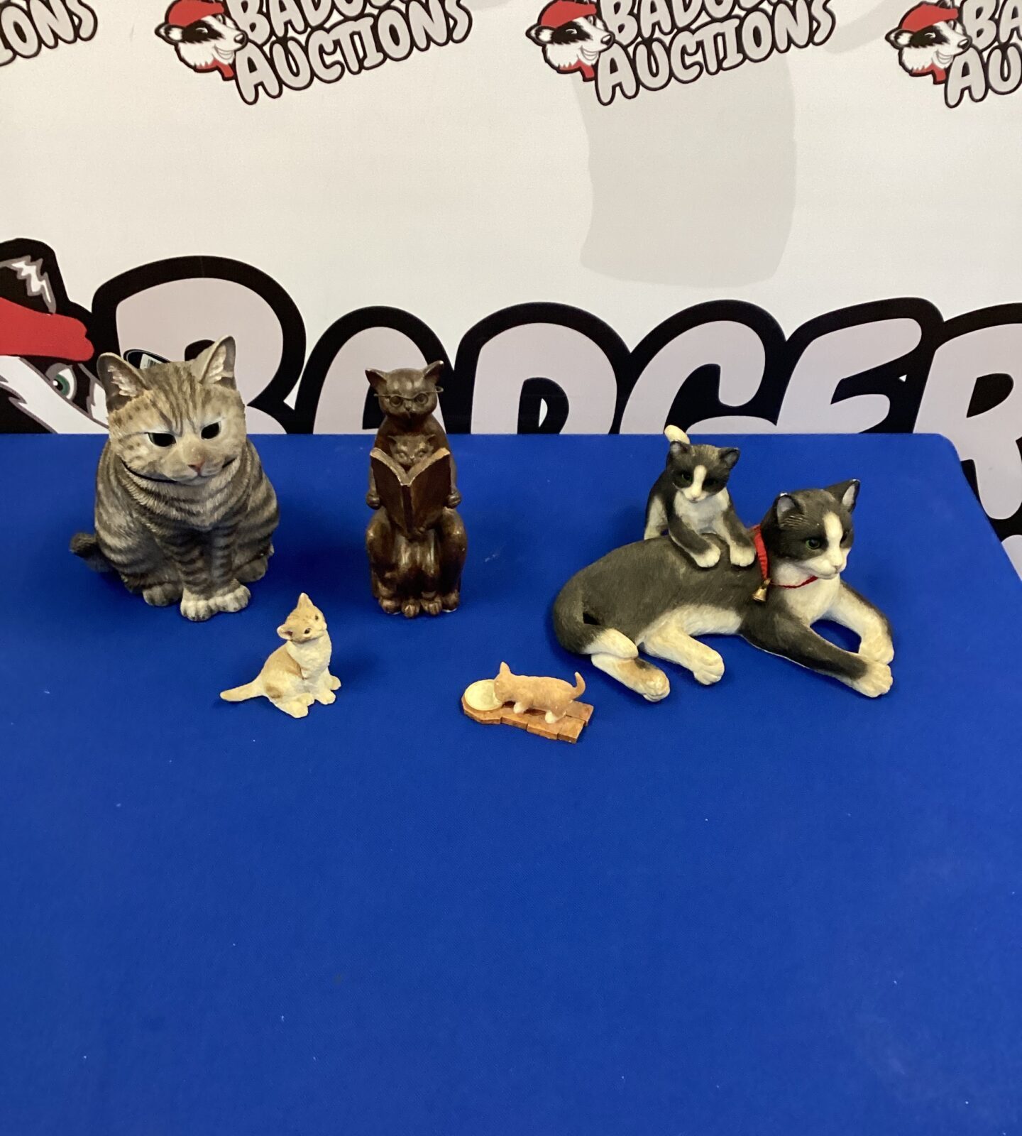 A collection of Cat figurines