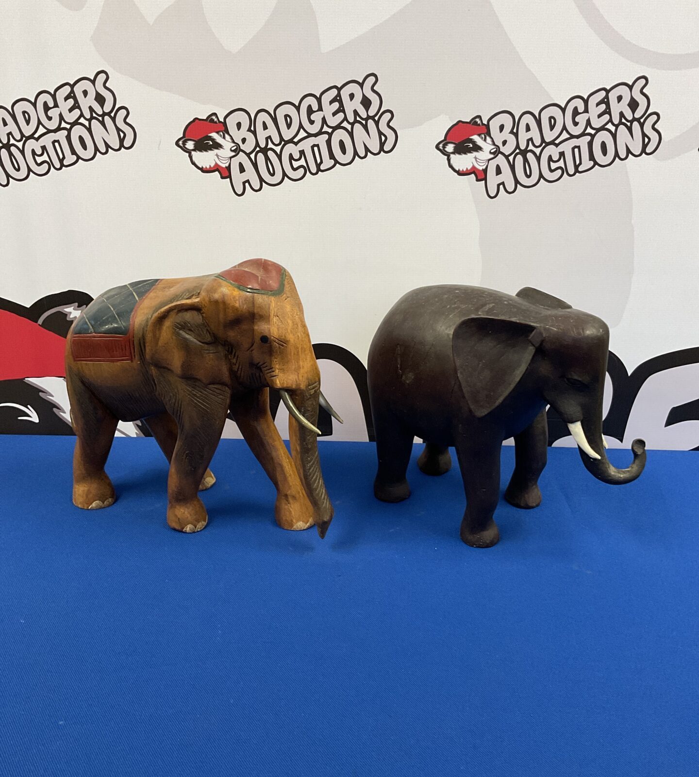 Two carved wooden elephants