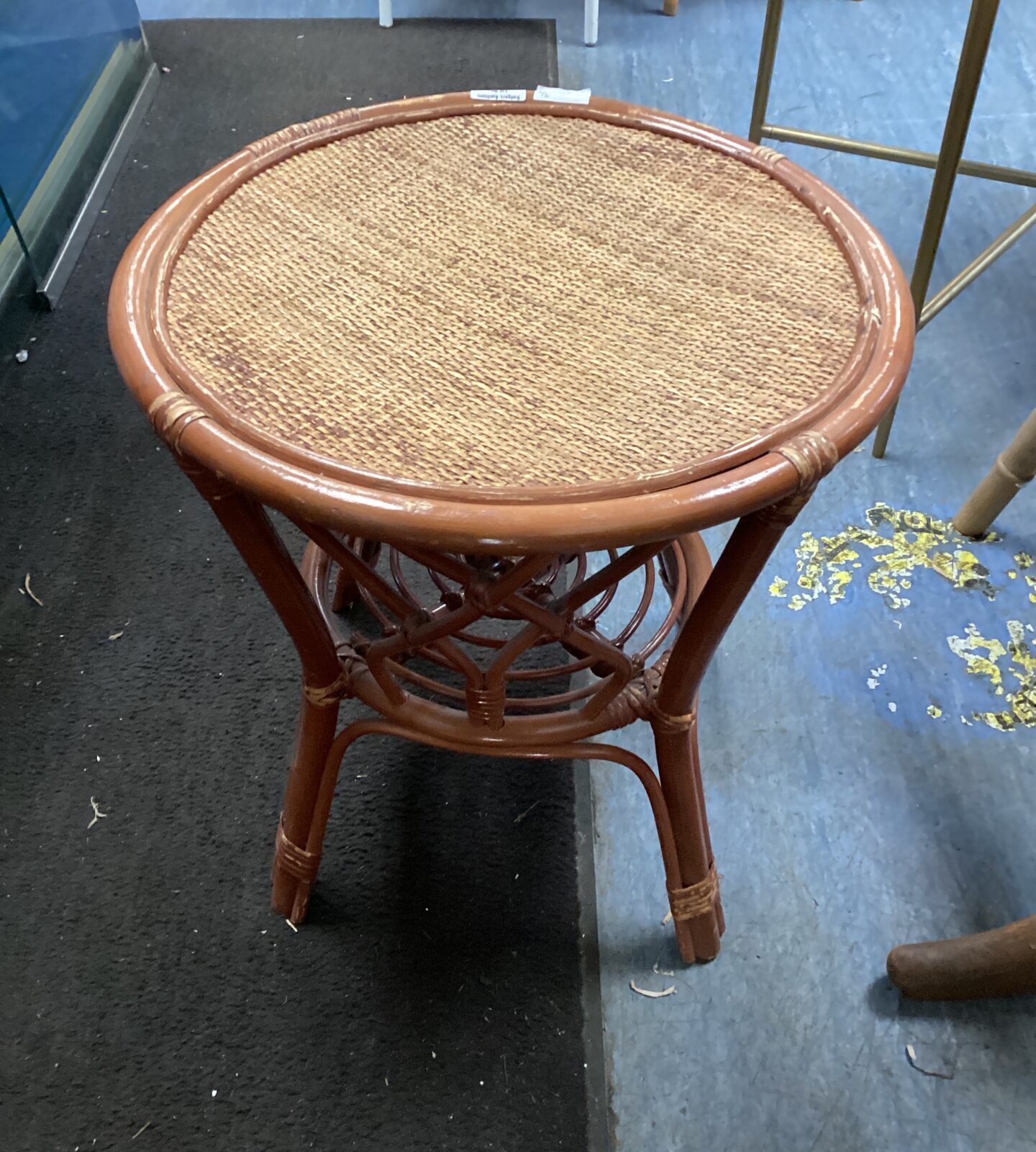 Small round woven topped side table