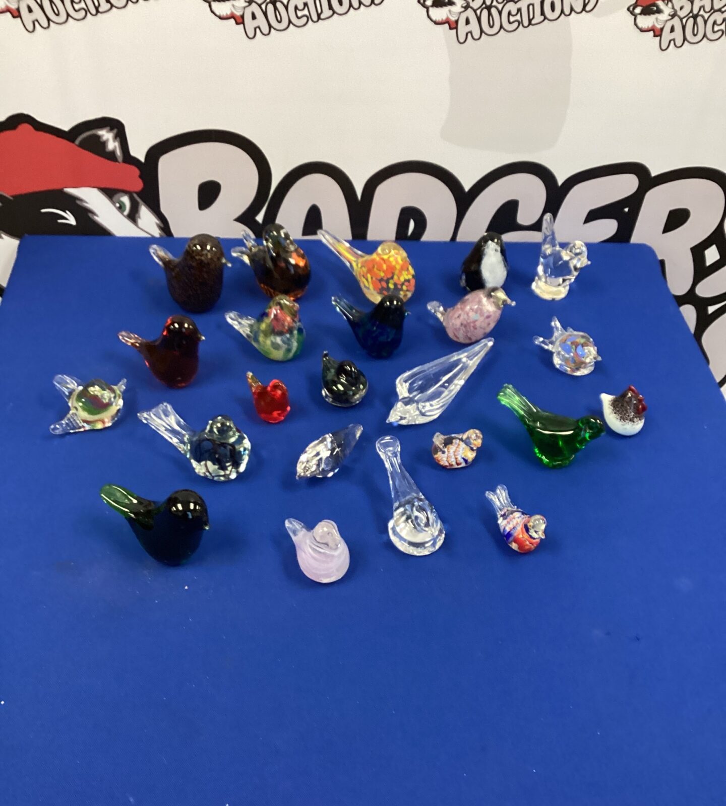 Large quantity of Glass bird paperweights