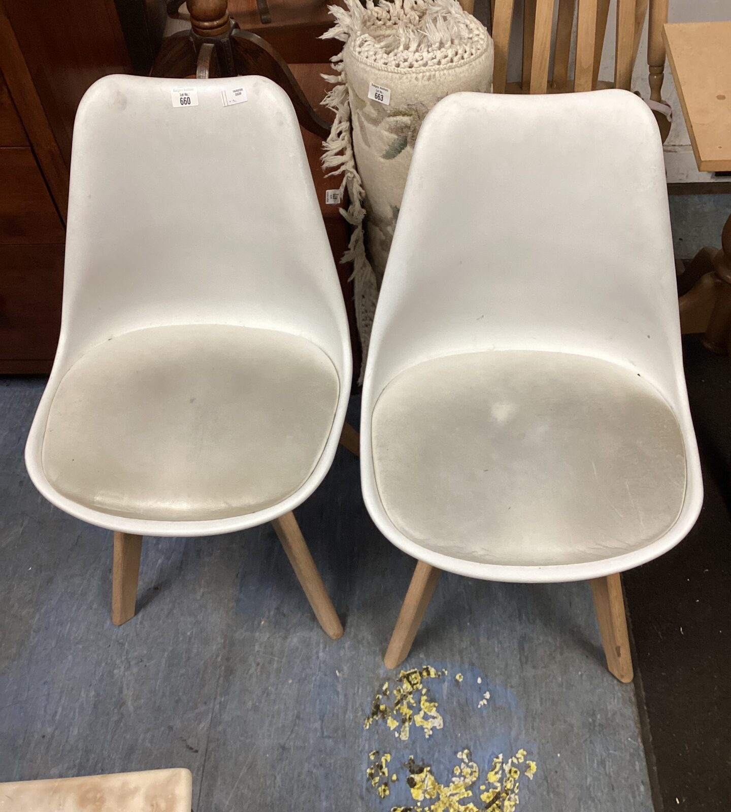 two white designer chairs