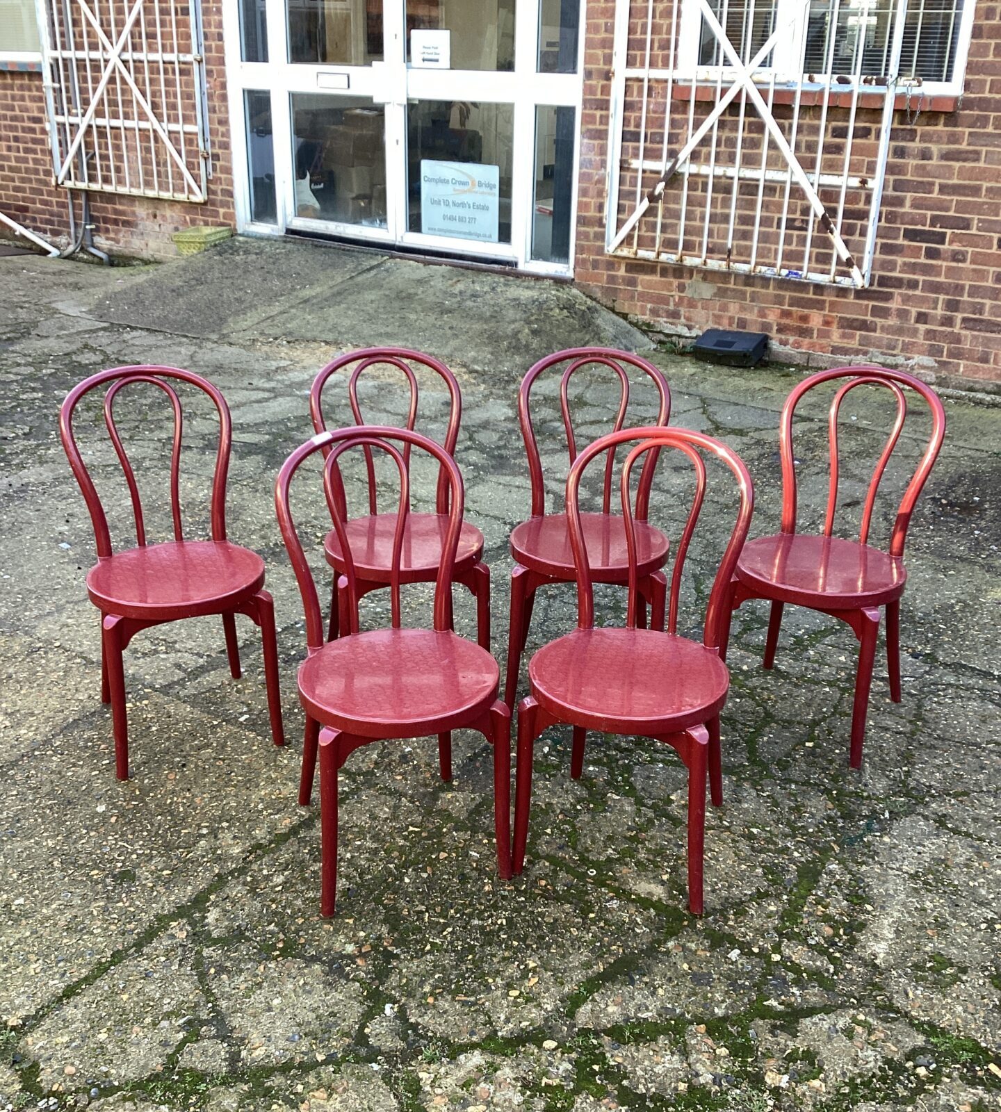 Six Plastic Garden Chairs