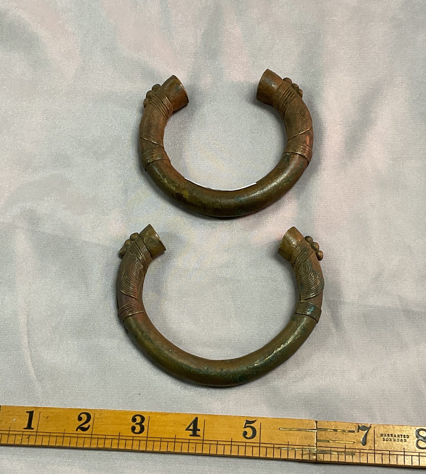 Pair of antique bronze slave bangles