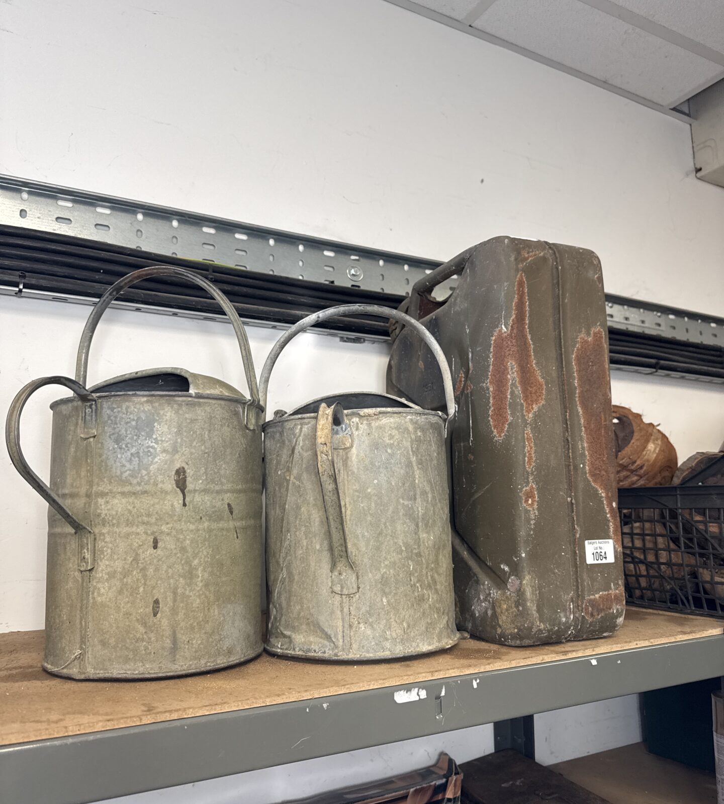 1951 dated military crows foot marked 20l Jerry can with two galvanised watering cans