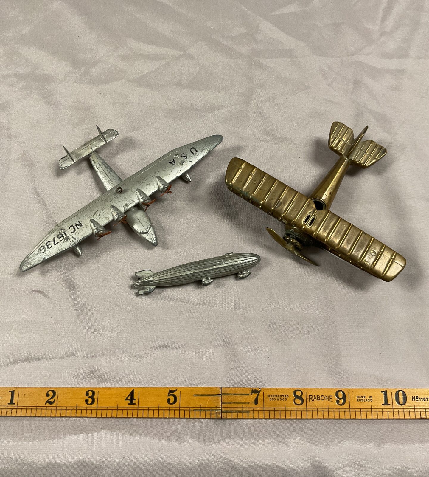 Vintage dinky pan am clipper aircraft Inc brass biplane and Diecast zeppelin