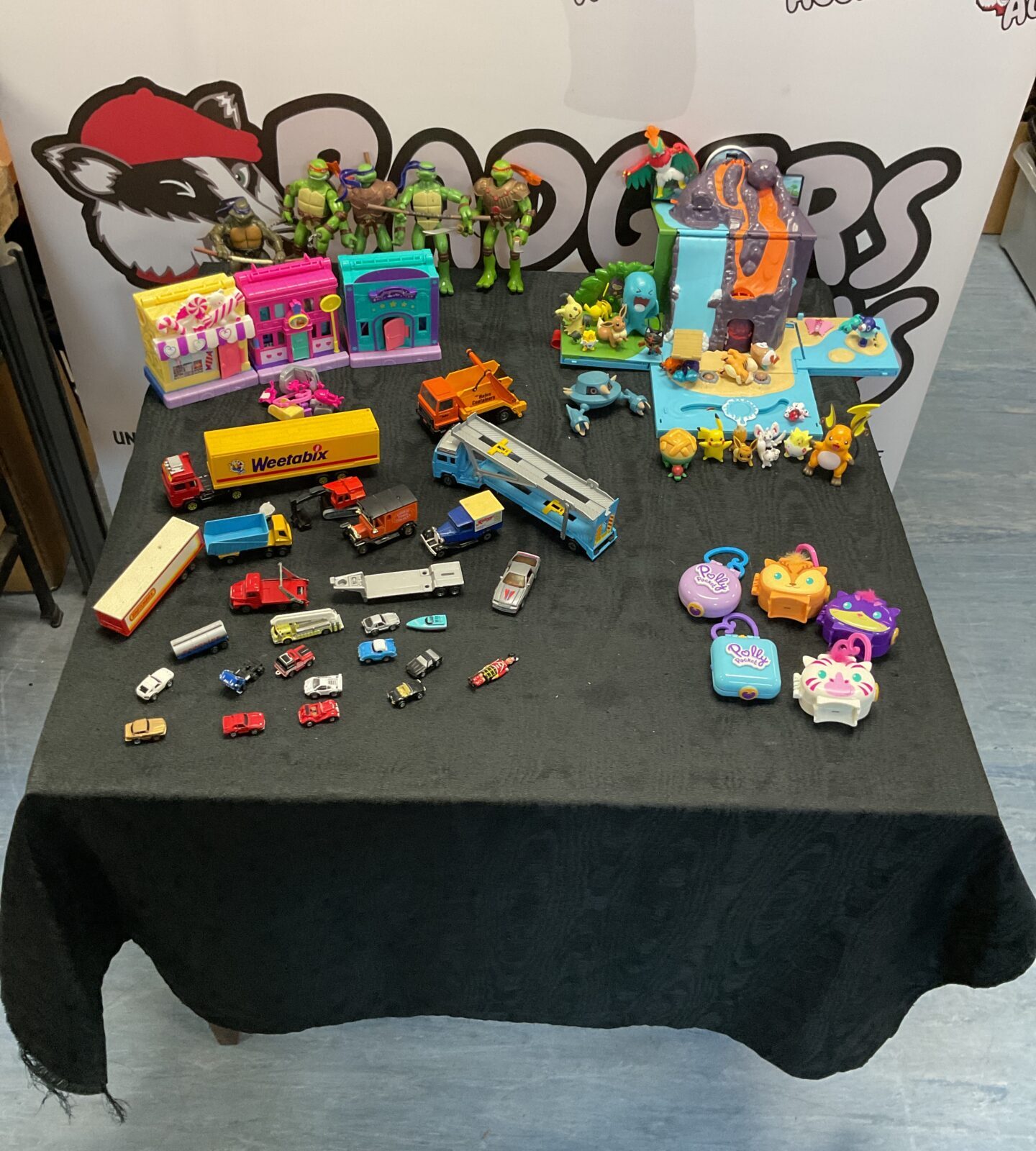 Box of mixed toys inc diecasts inc corgi, Pokemon island playset with pokemon figures, Ninja turtle figures and polly picket playground house sets