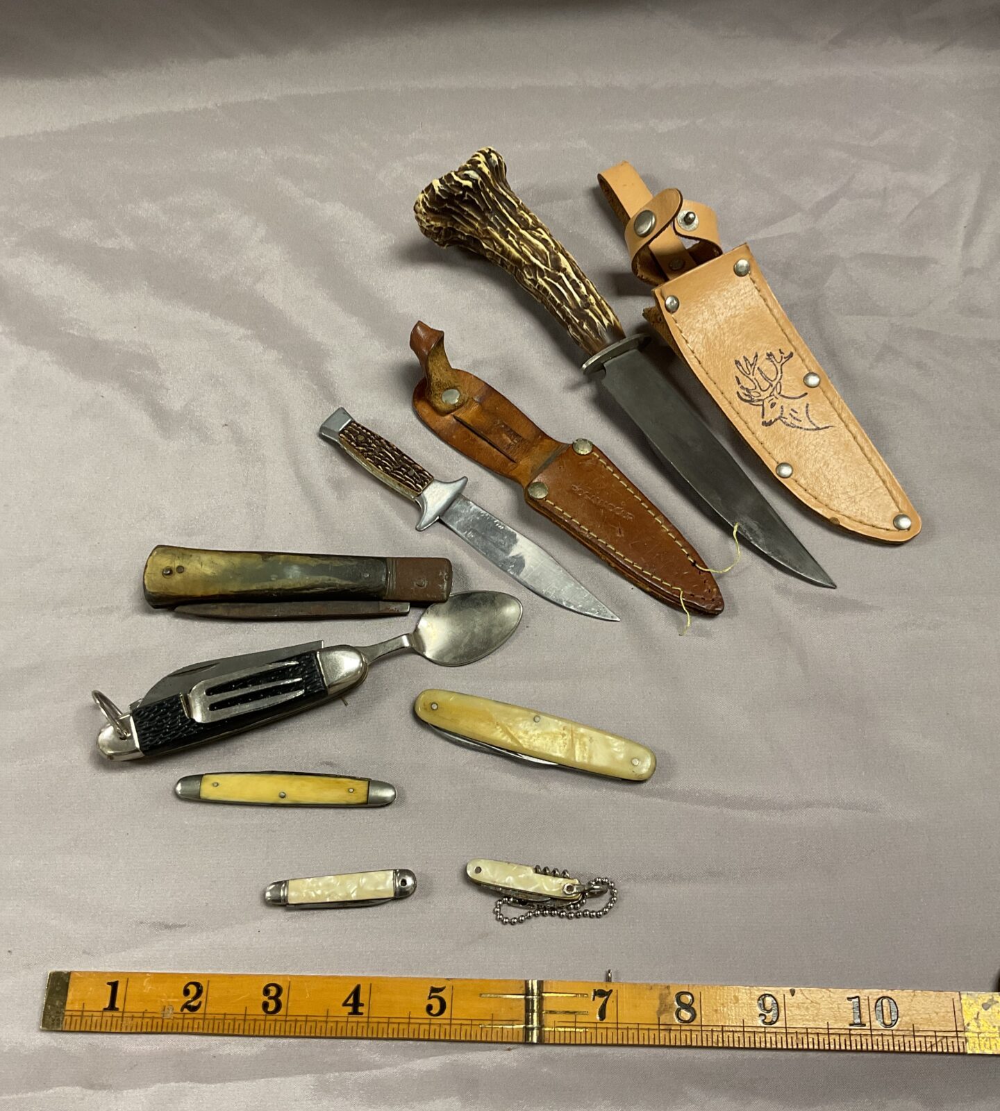 Collection of sheath knives and pocket knives