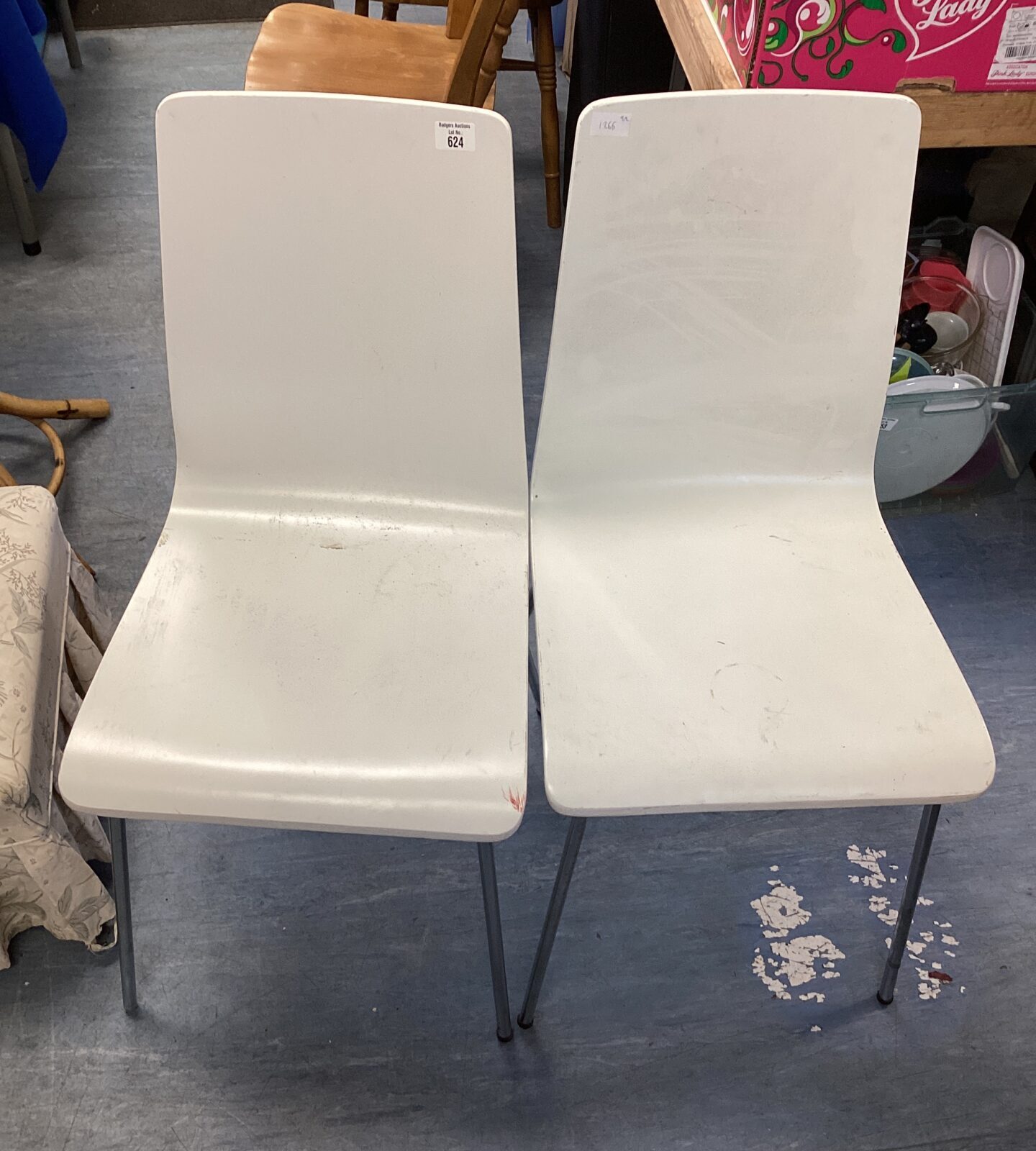 Two white dining chairs