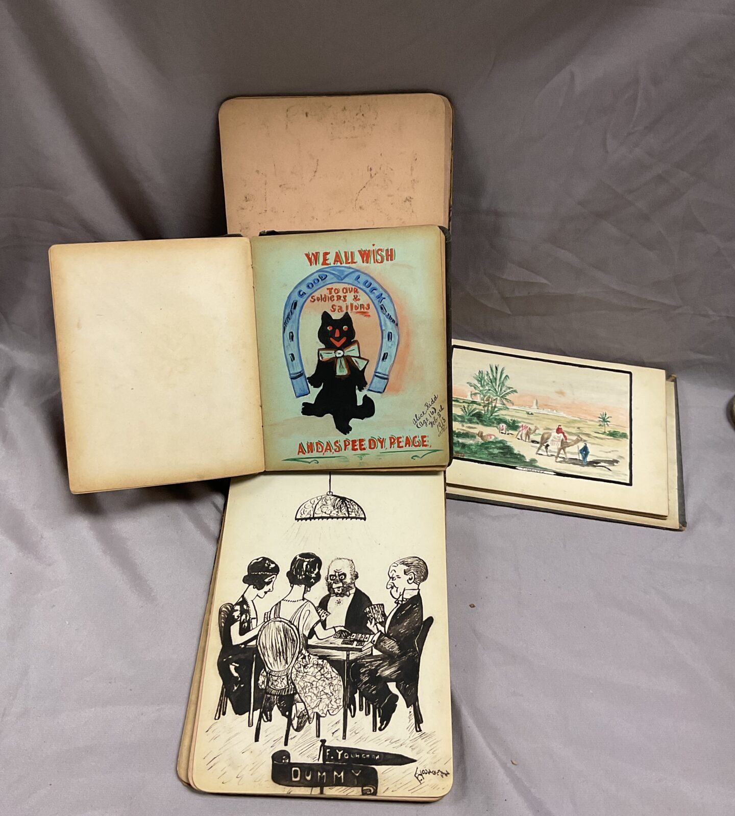 Three Early 1900s pocket books with assortment of water colours and poems