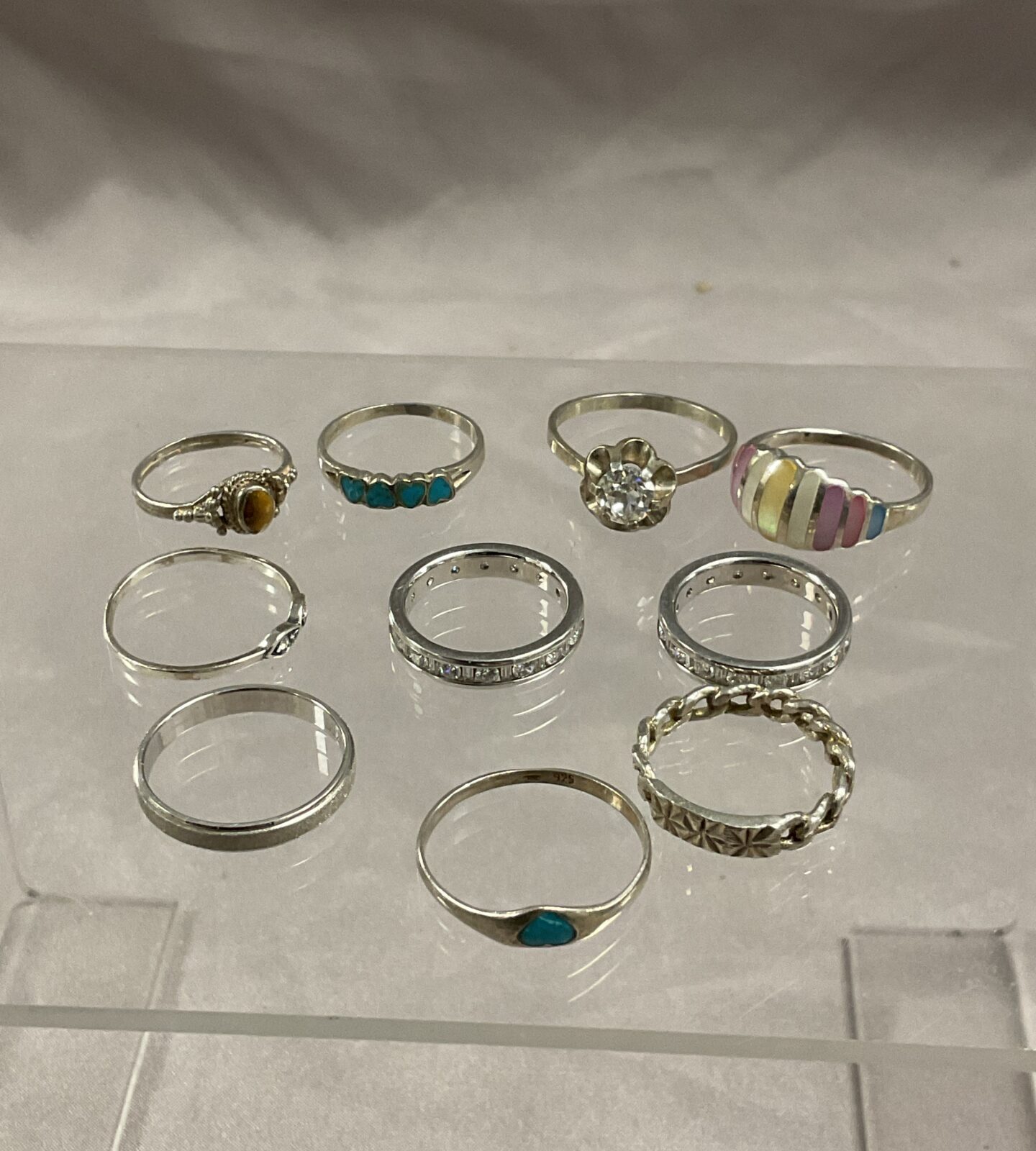 Ten silver rings assorted sizes 17.4 g gross