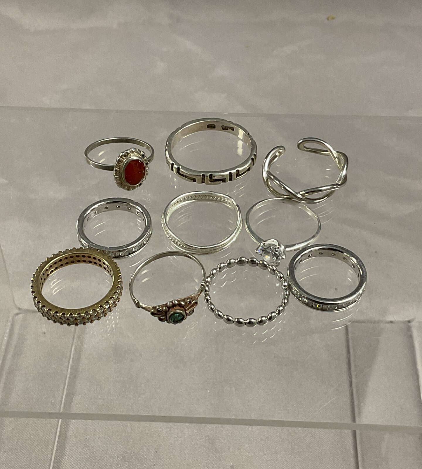 Ten silver rings assorted sizes 20.9 g gross