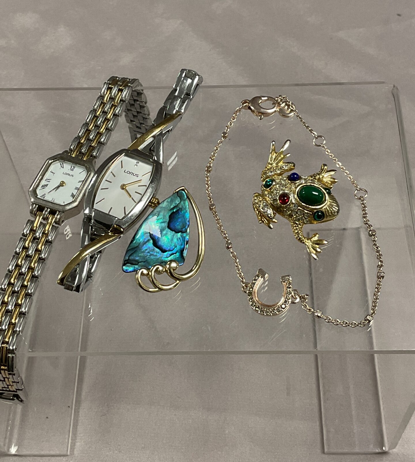 Two lorus watches two brooches inc a frog and bracelet