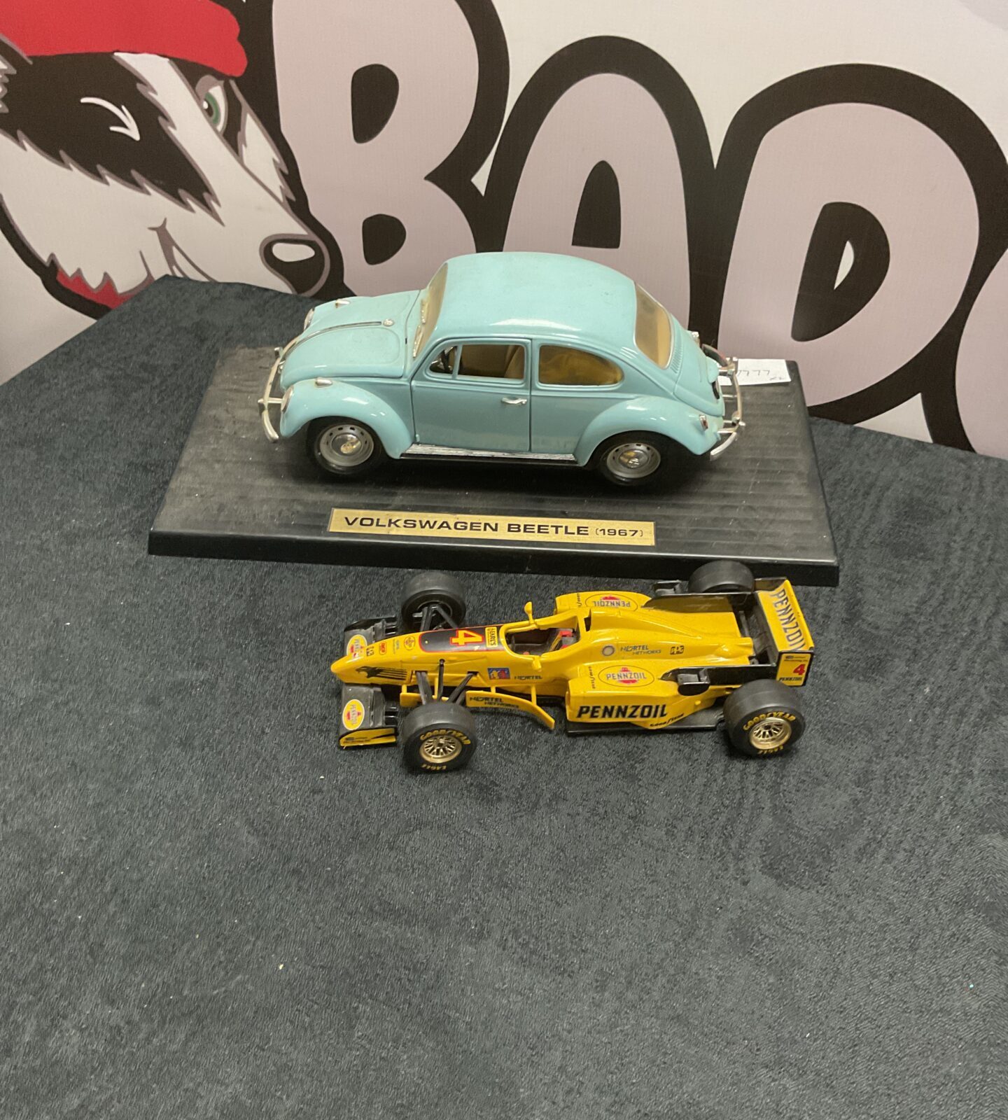 Two diecasts inc voltswagen beetle and burago formula 1