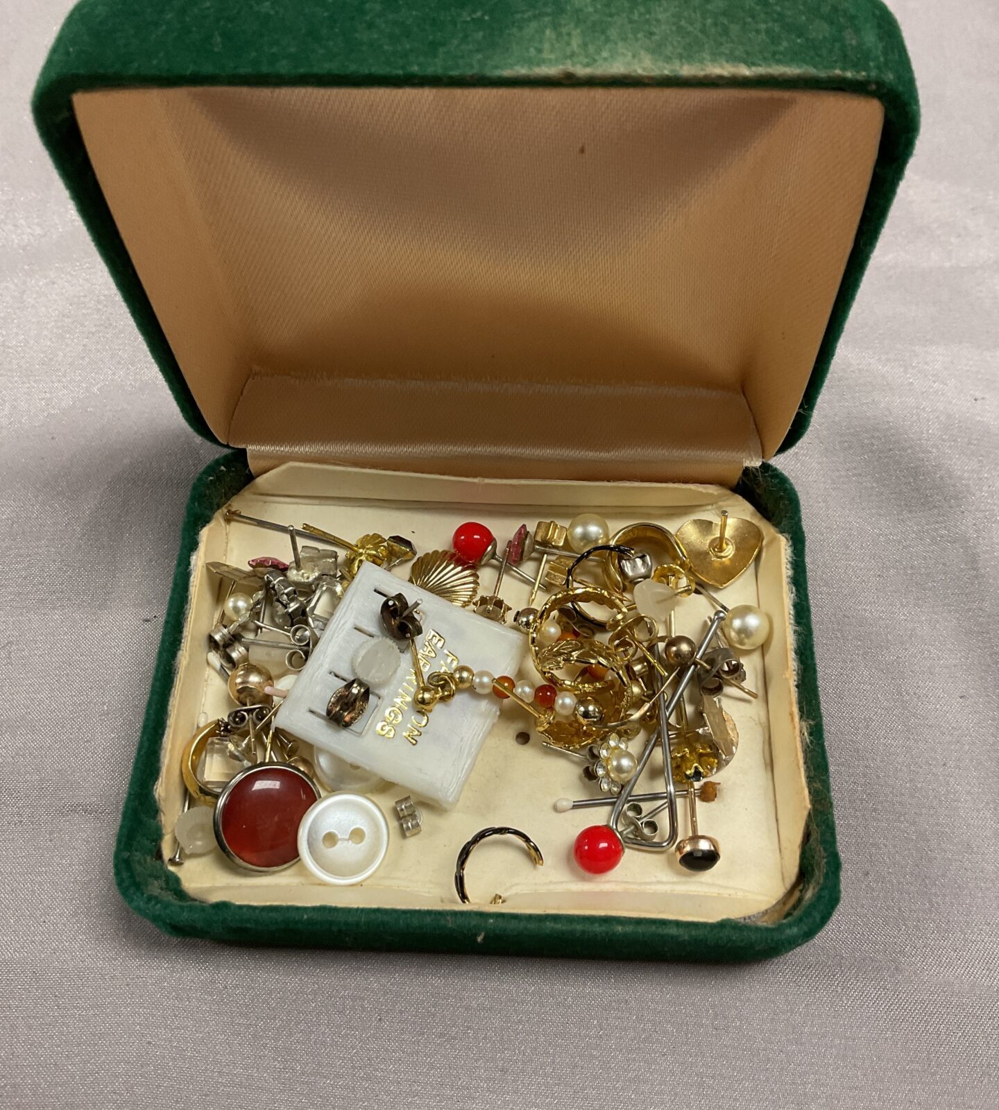 Box of assorted earrings