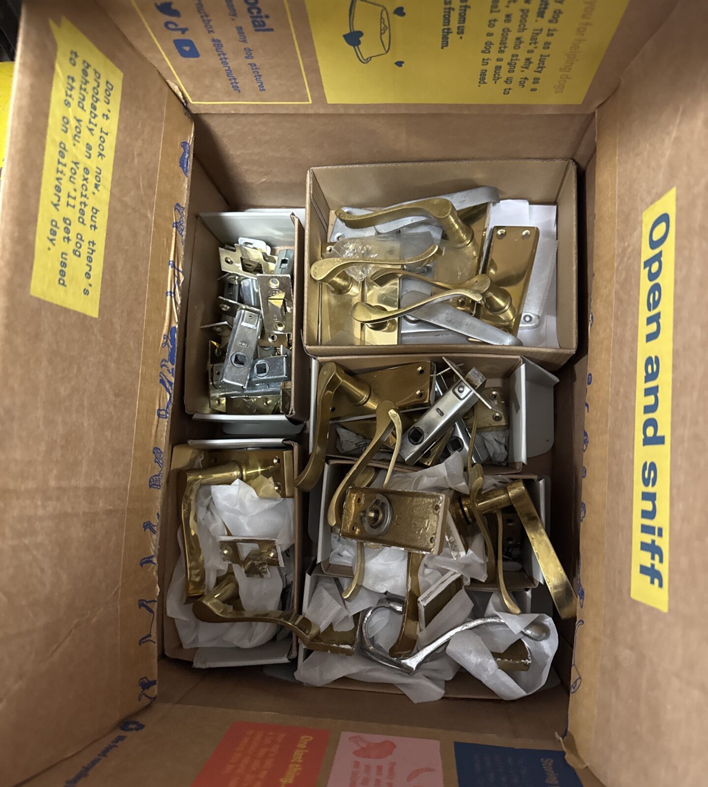 Box of assorted door furniture