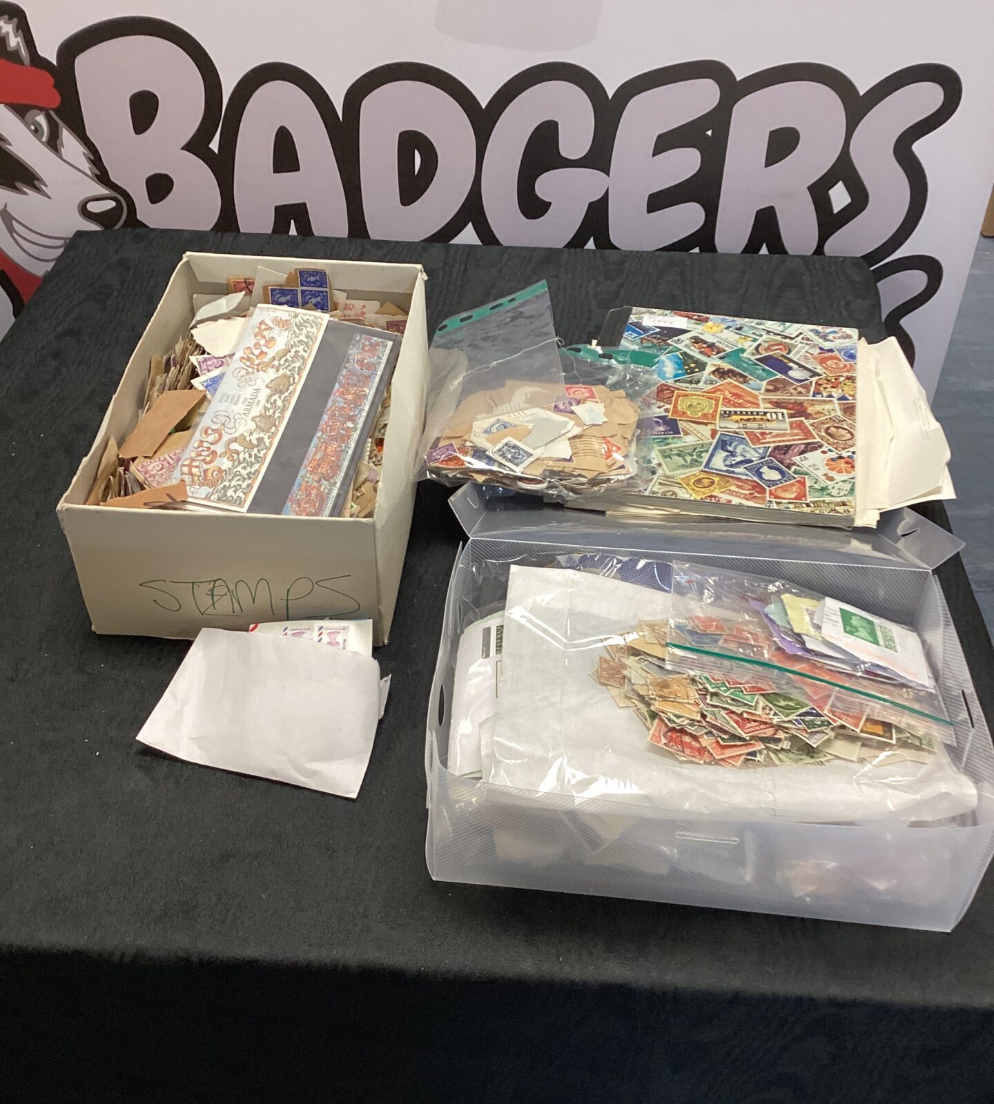 large bag of stamps and albums