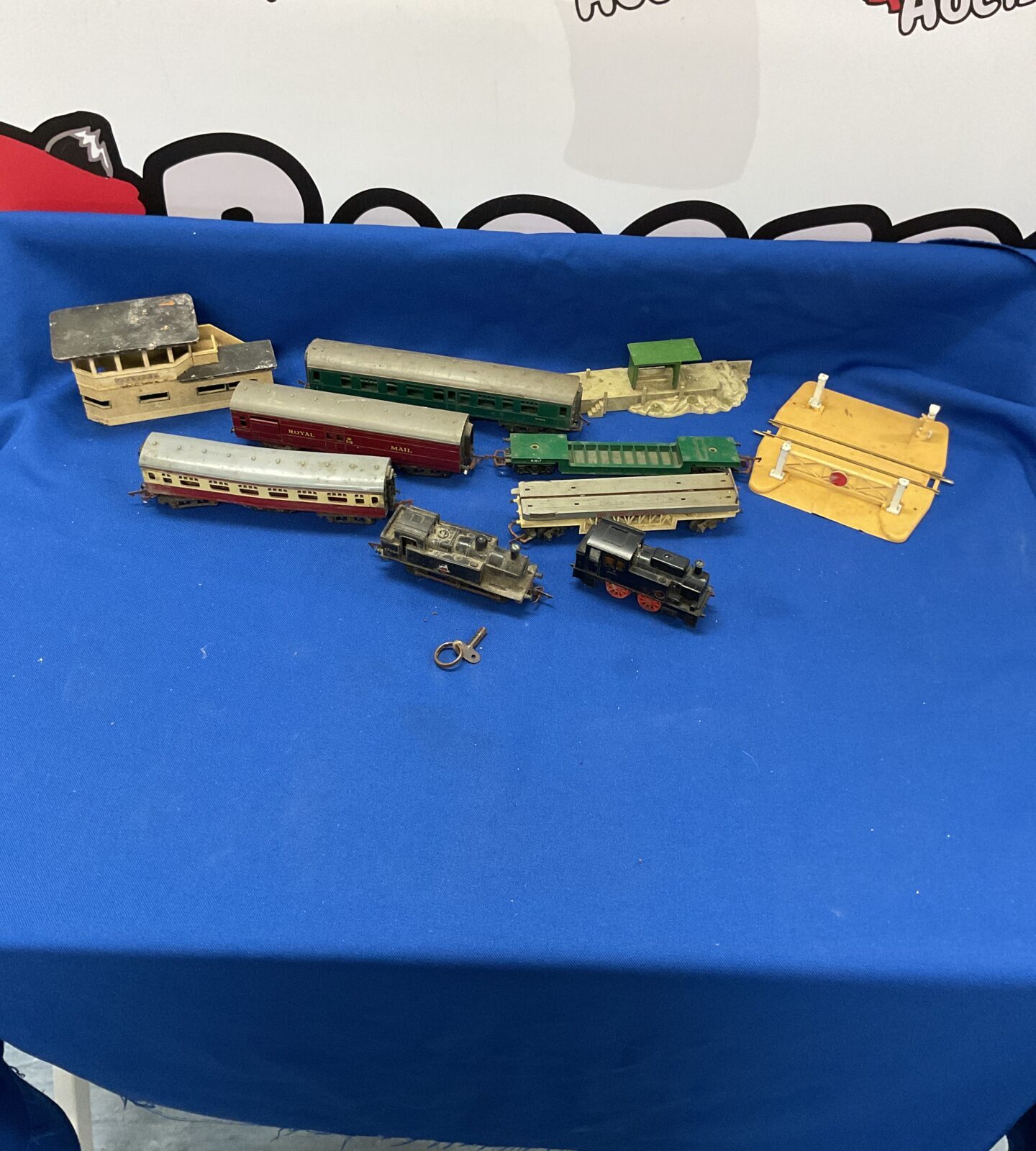 Box of trinag and hornby trains, carriages and accessories