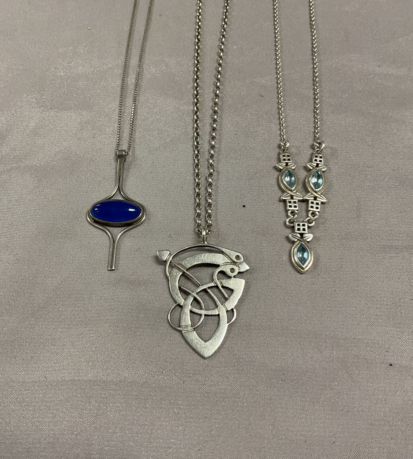 Three silver Celtic style Pendant necklaces