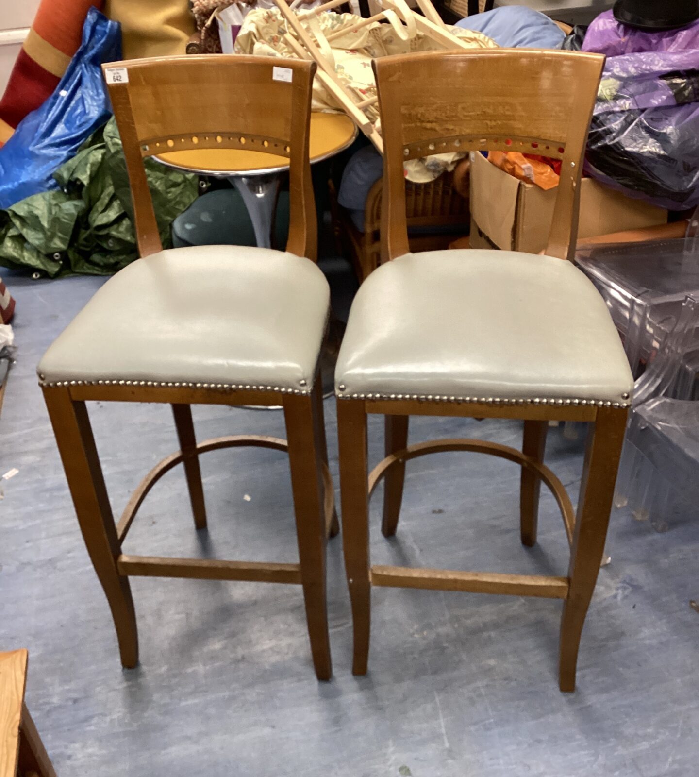 Two leather seated bar stools