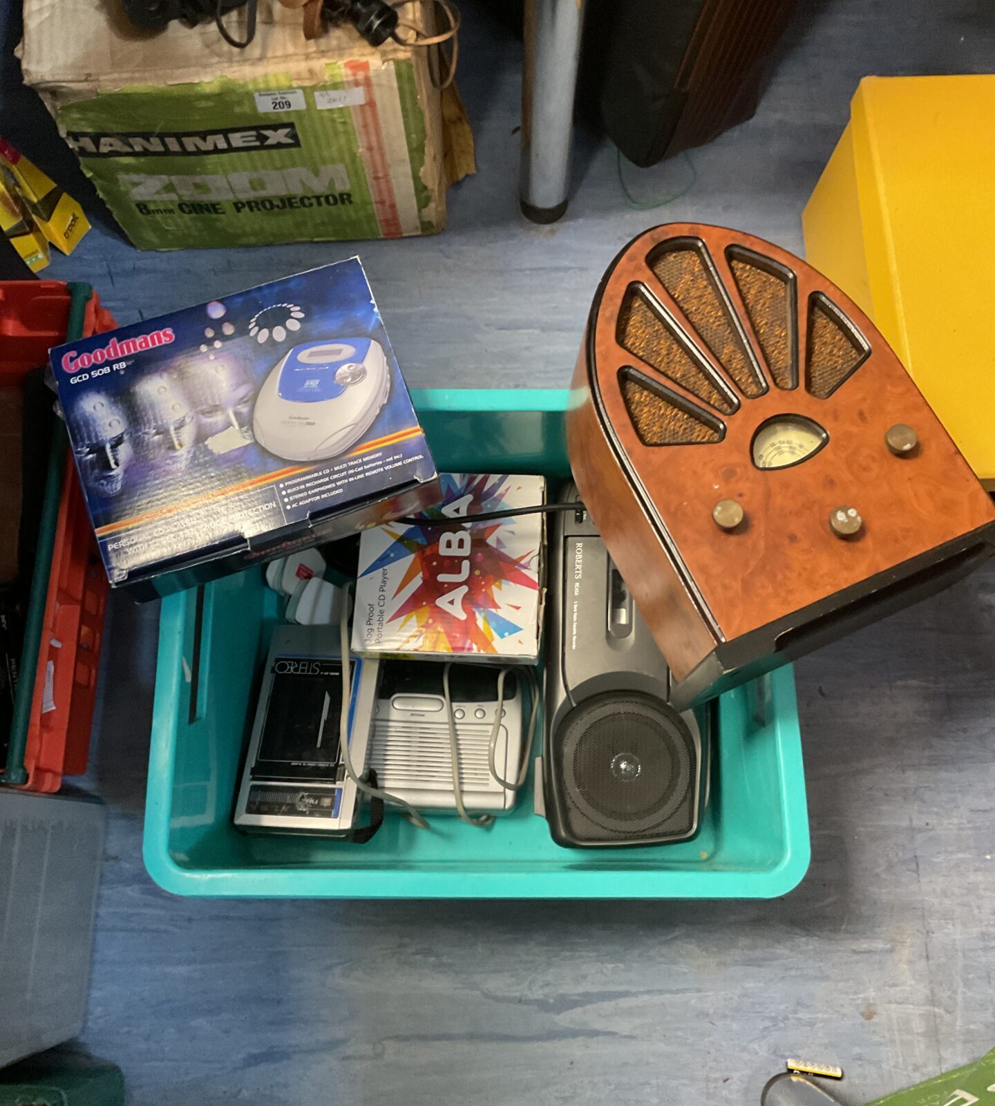 Box of personal cd players & radios inc roberts