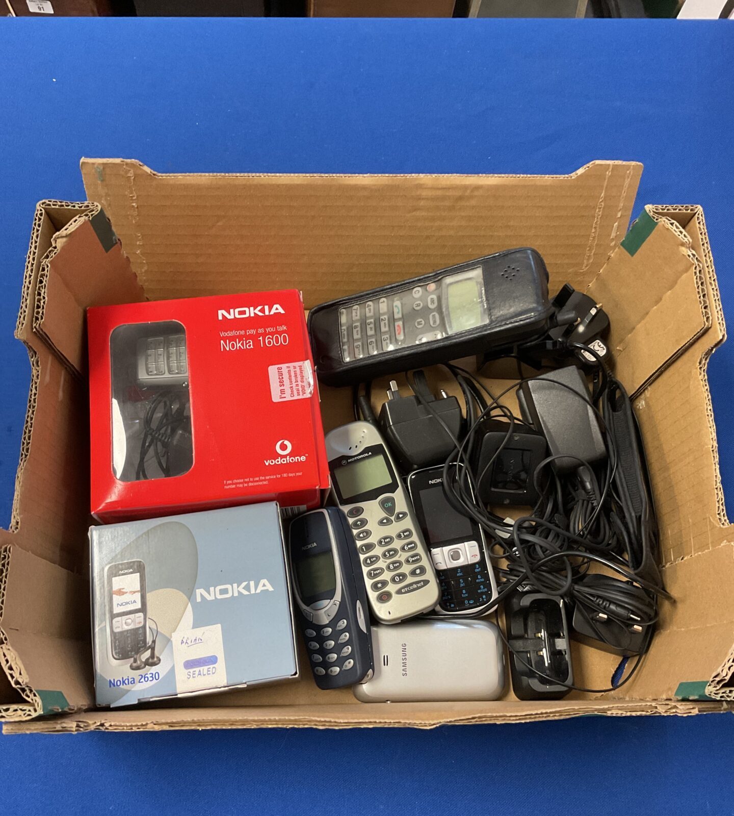 Tray of retro mobile phones including nokia