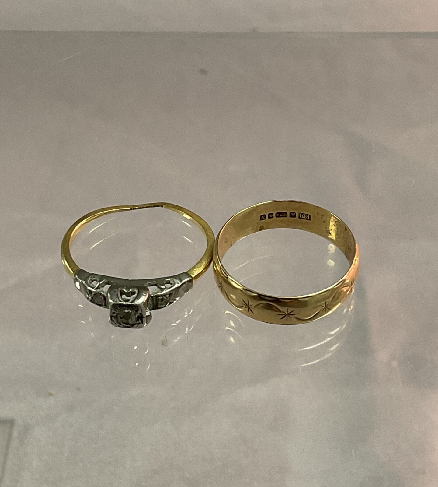 Two 9ct gold rings one platinum set with 3 diamonds 3.88g gross