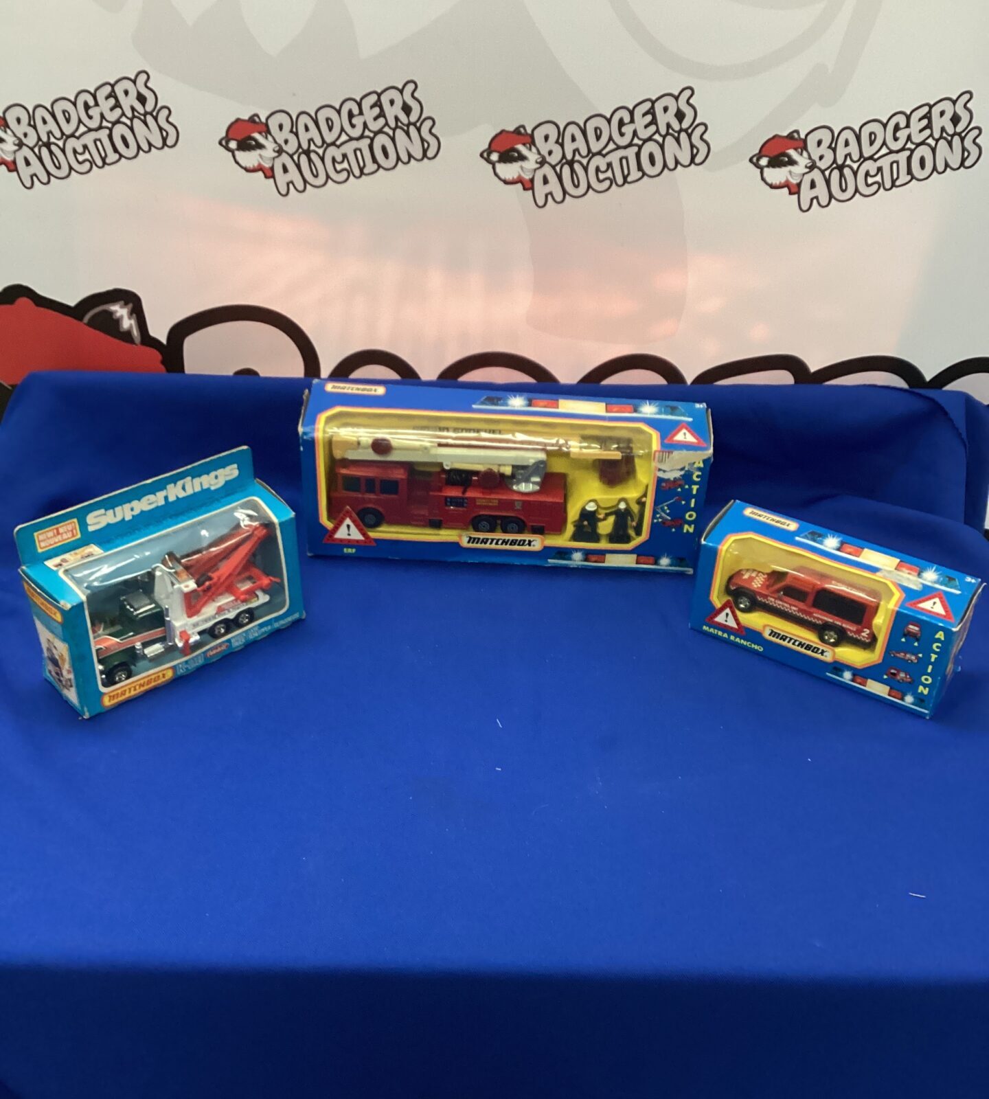 Three Matchbox Vehicles in boxes