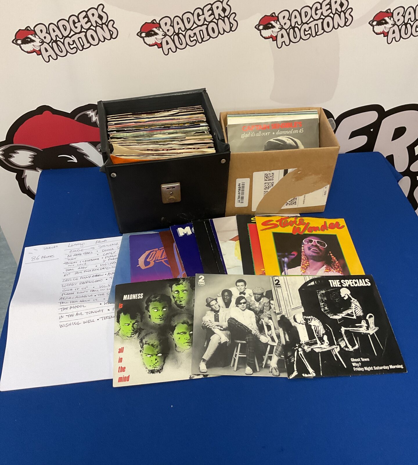 Collection of 7” single vinyl records including the specials & madness