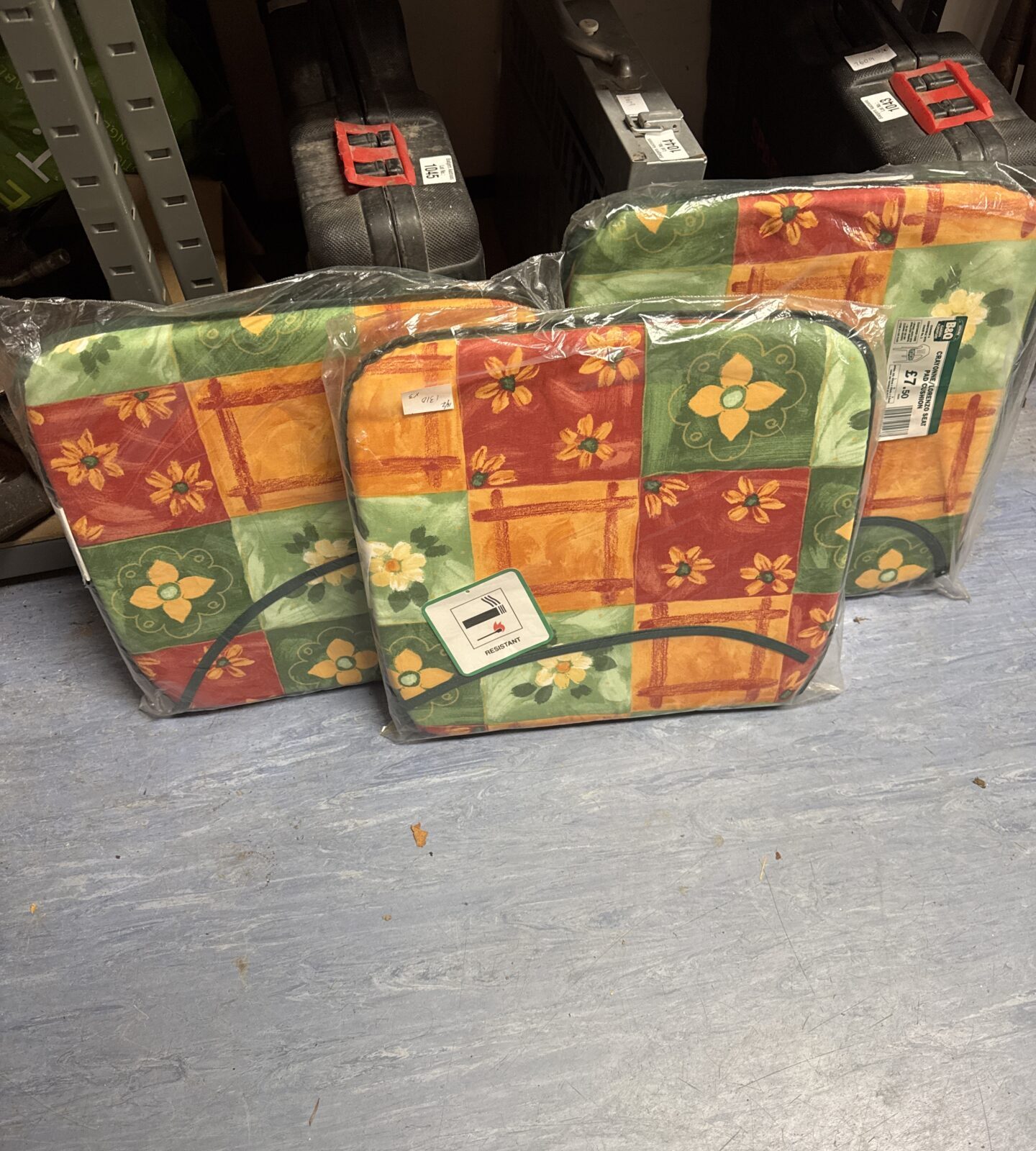 Three new floral patterned chair cushions