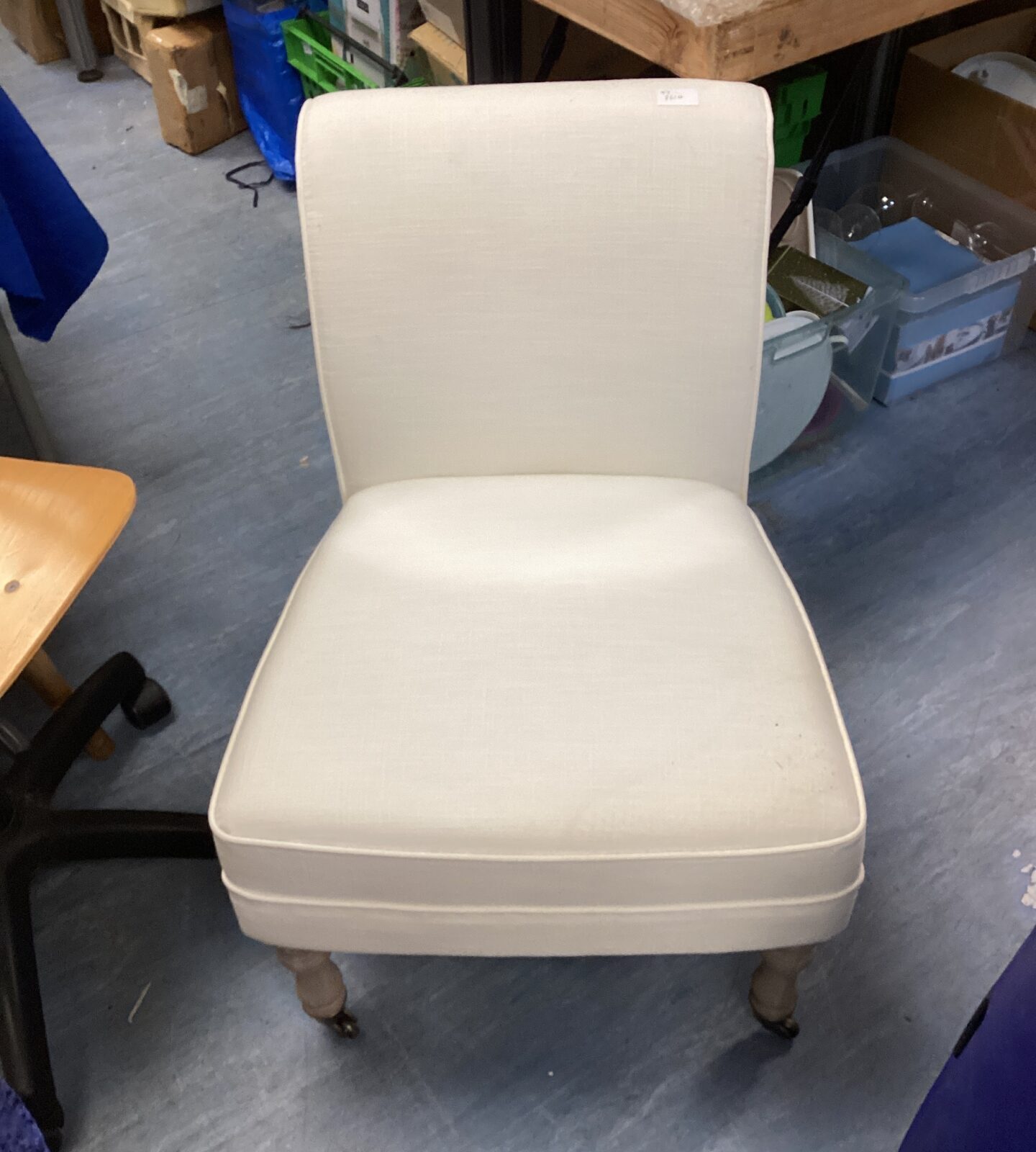 White upholstered nursing chair