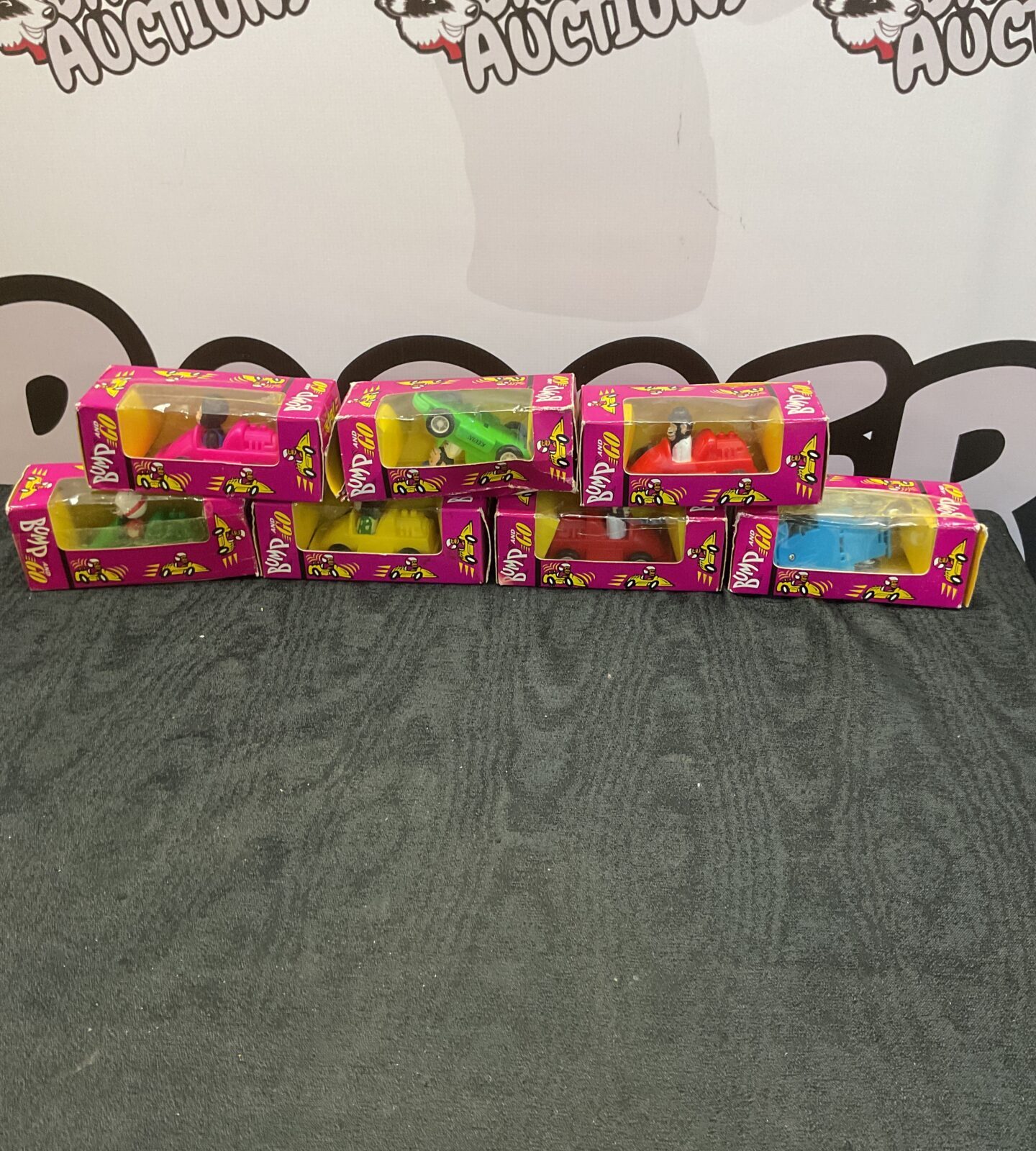 Seven bump and go boxed toy cars