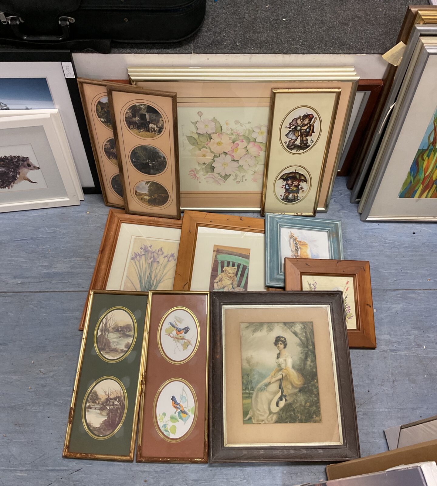 Large collection of framed prints