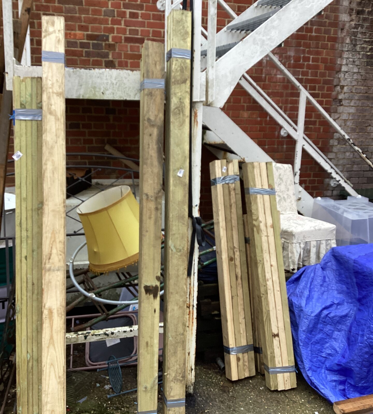 Three bundles of timber 8’