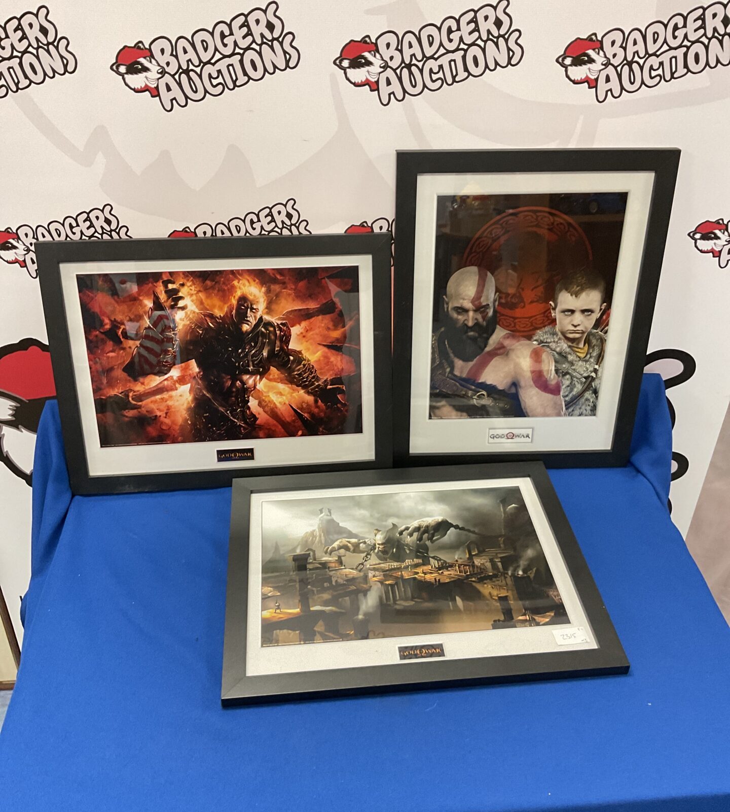 Three framed god of war game prints