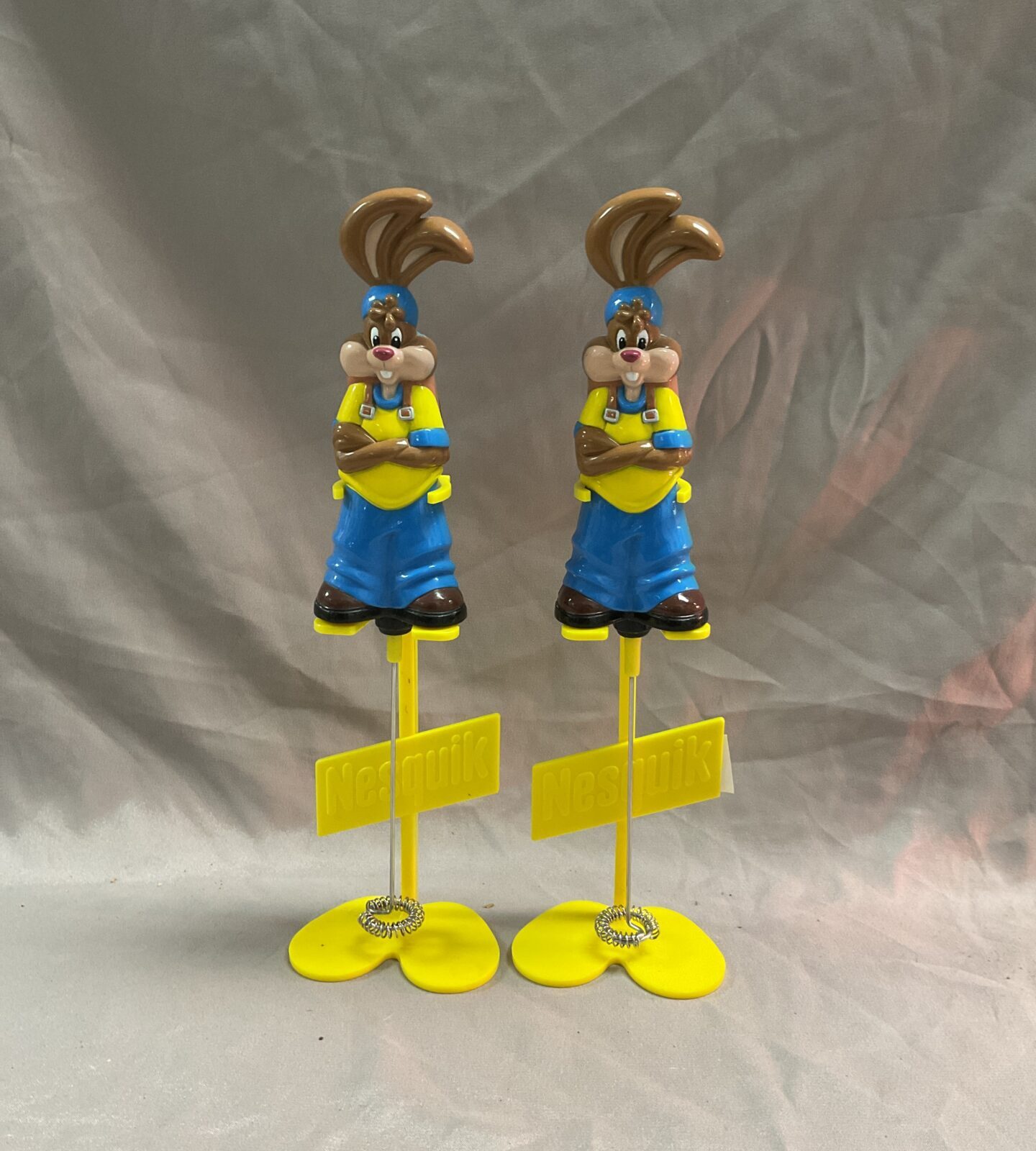 Two nesquik milkshake stirrers